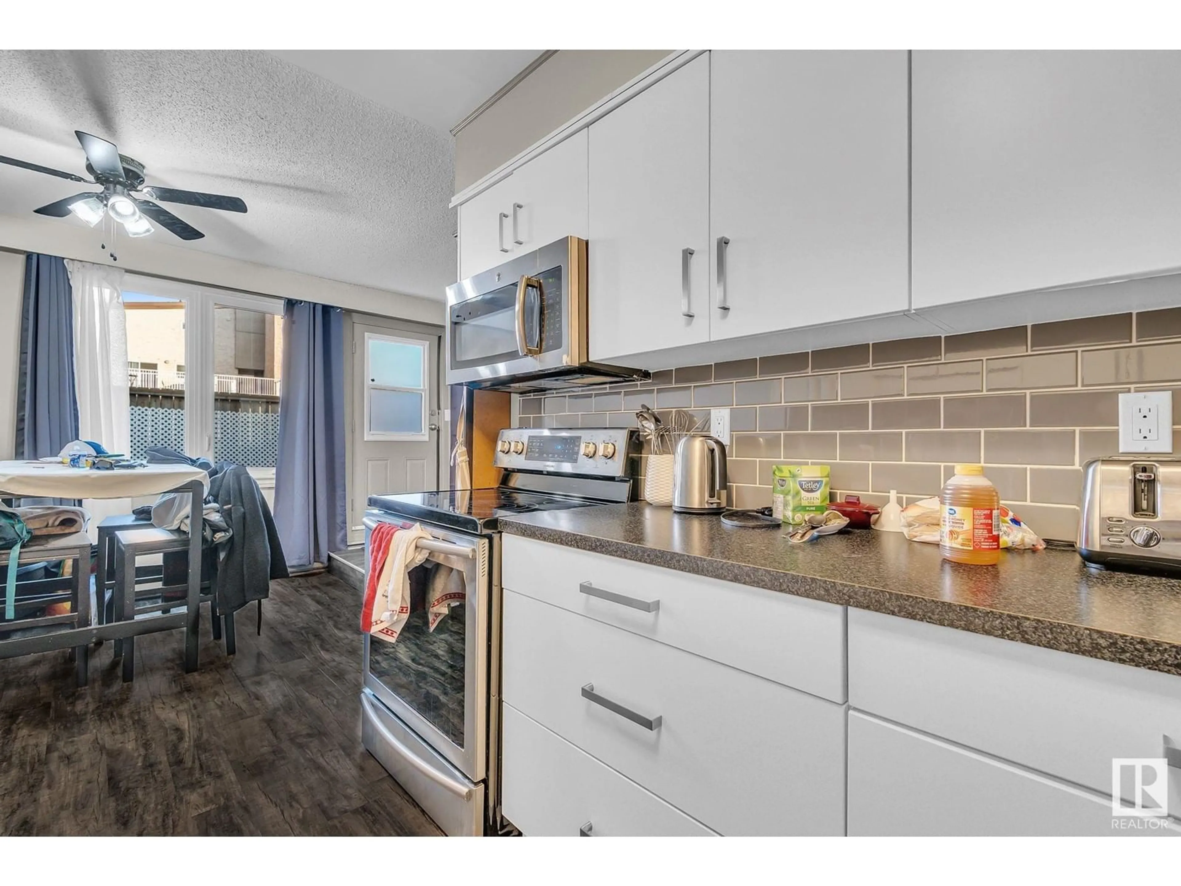 Open concept kitchen, unknown for #112 - 7805 159 ST NW, Edmonton Alberta T5R2E1
