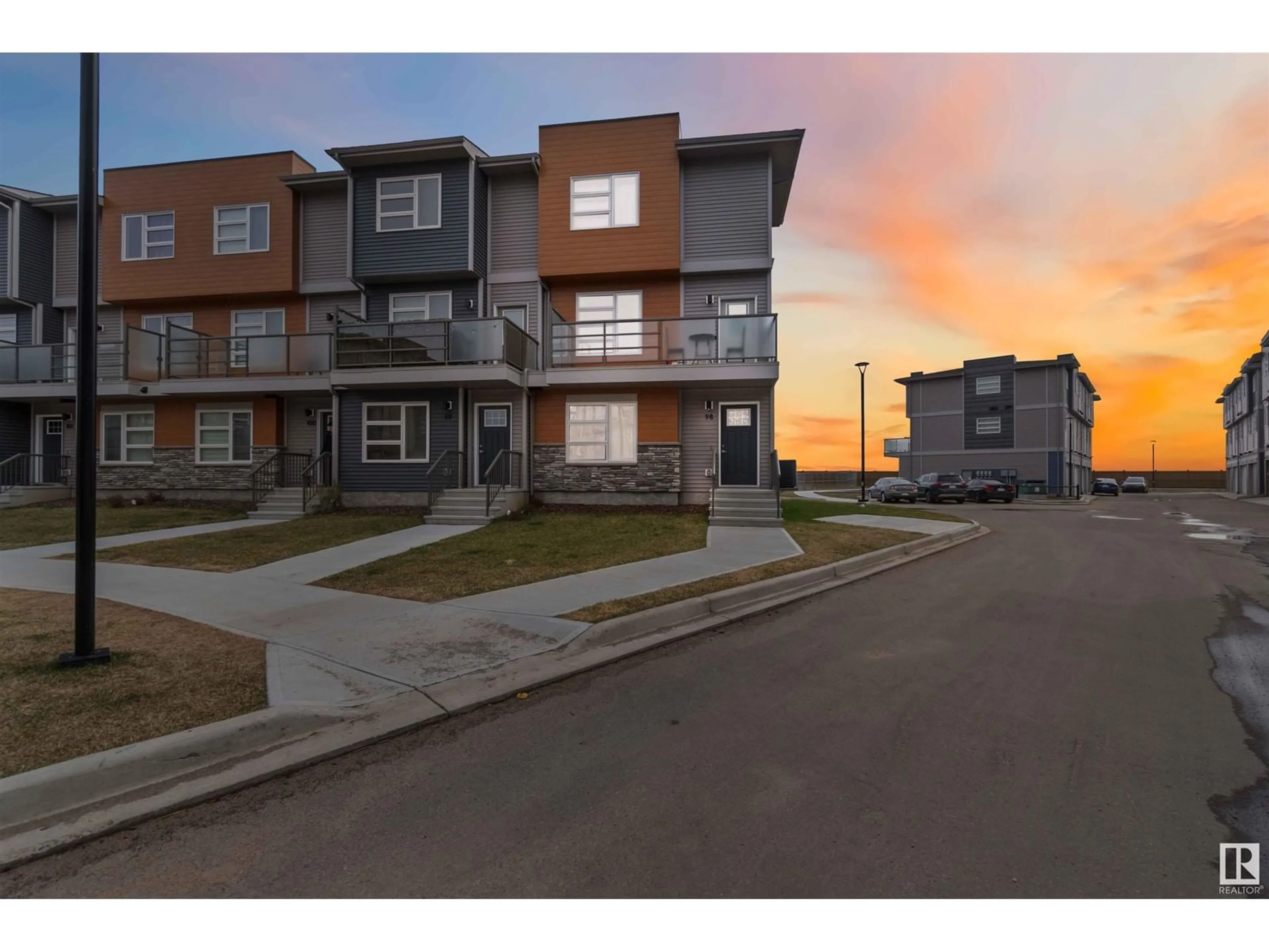 A pic from outside/outdoor area/front of a property/back of a property/a pic from drone, street for NW - 98 17635 58 ST, Edmonton Alberta T5Y4C4