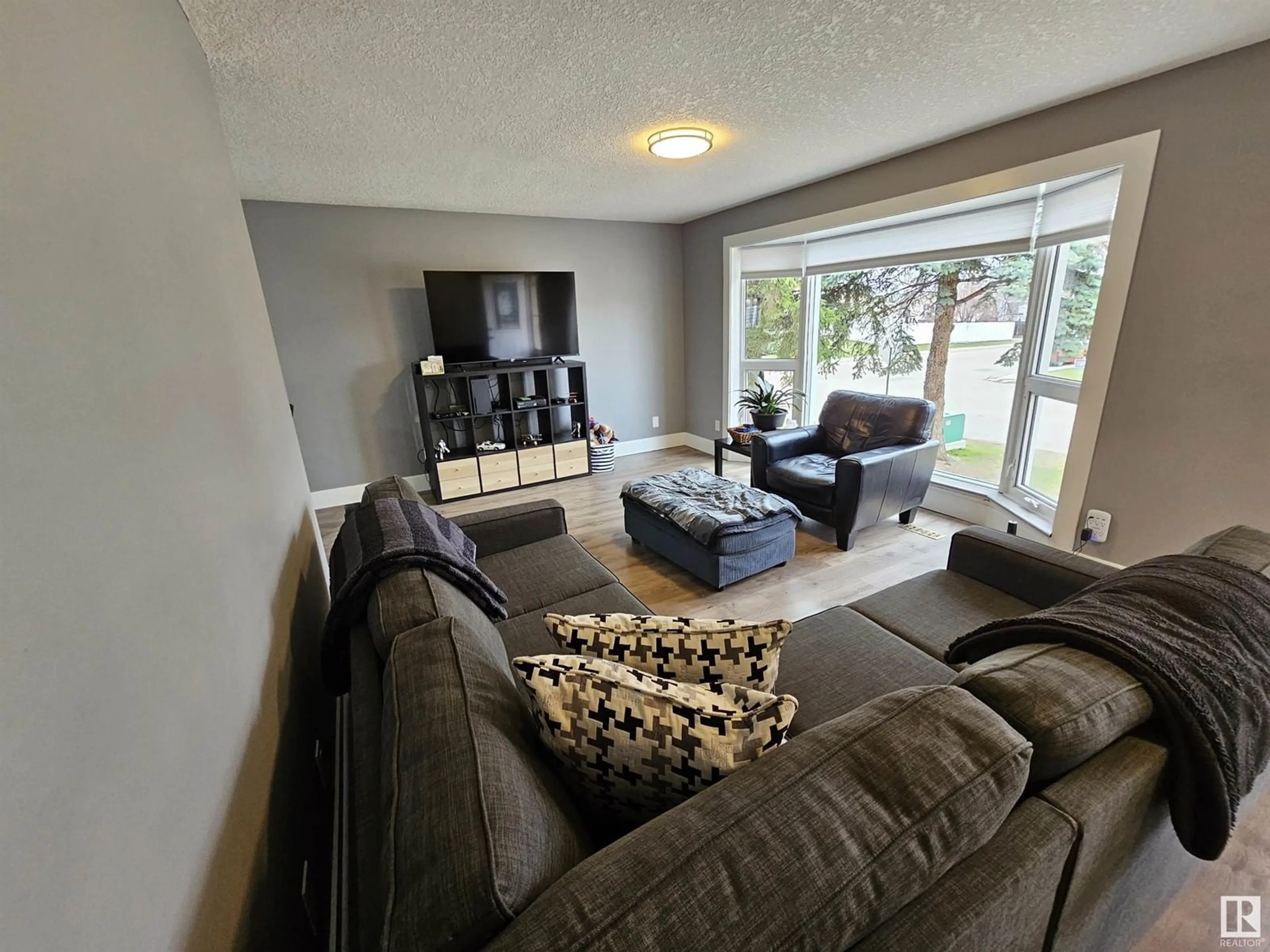 Living room with furniture, unknown for 1103 41 ST, Edmonton Alberta T6L2K3