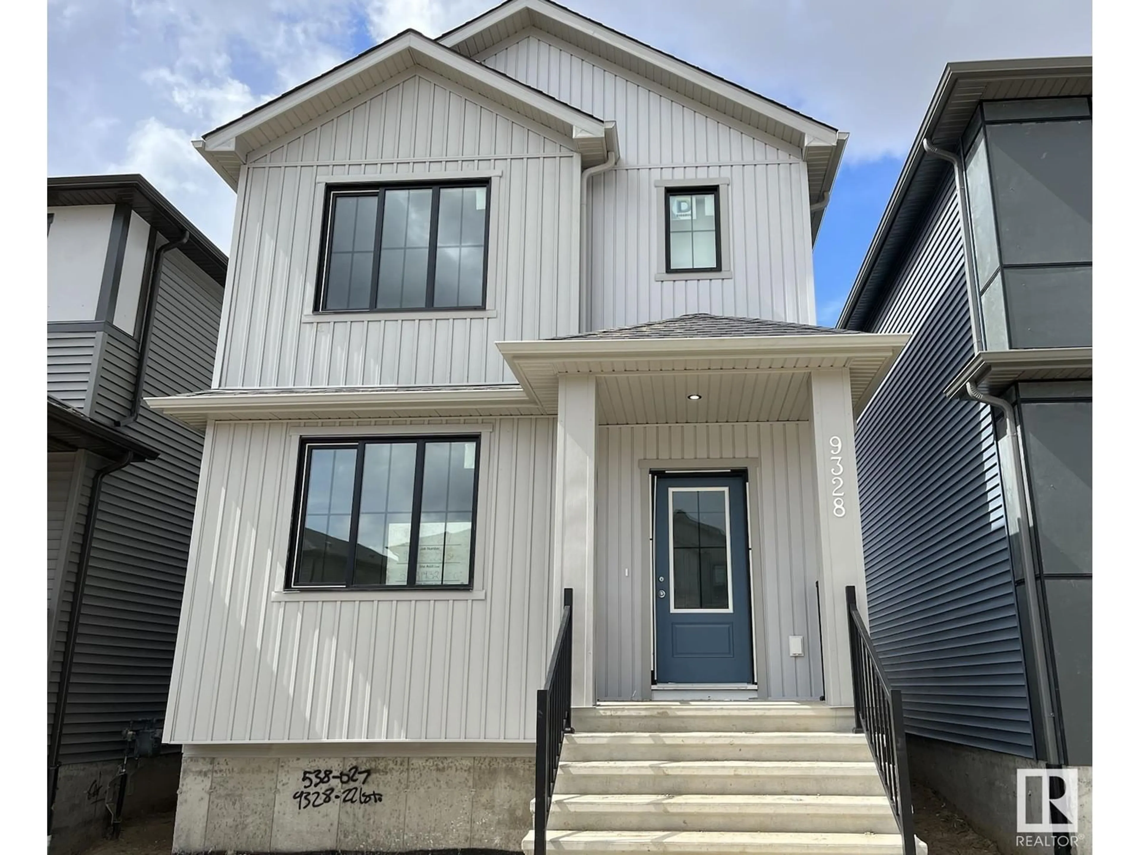 Home with vinyl exterior material, street for NW - 9328 221 ST, Edmonton Alberta T5T6C9