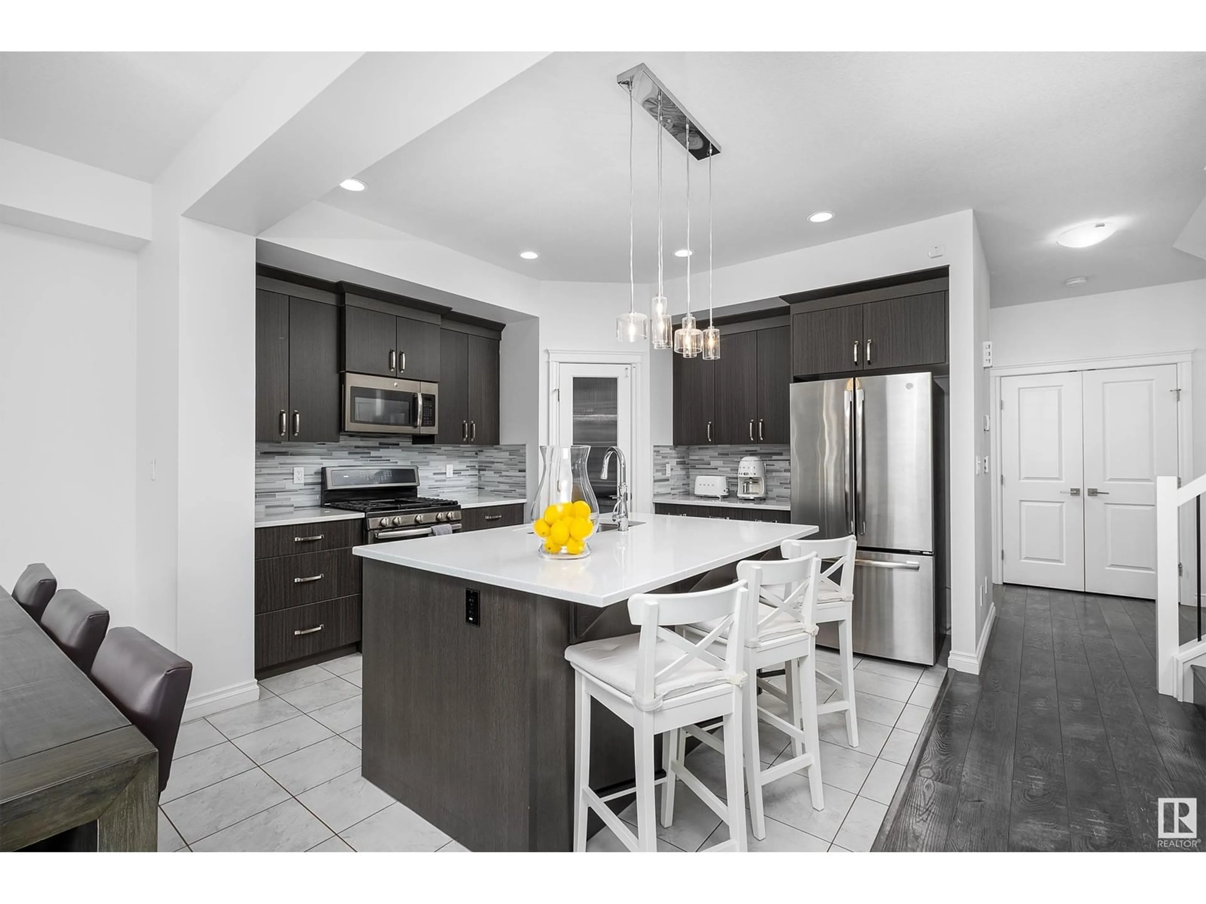 Open concept kitchen, ceramic/tile floor for 203 SIMPKINS BN, Leduc Alberta T9E0E8