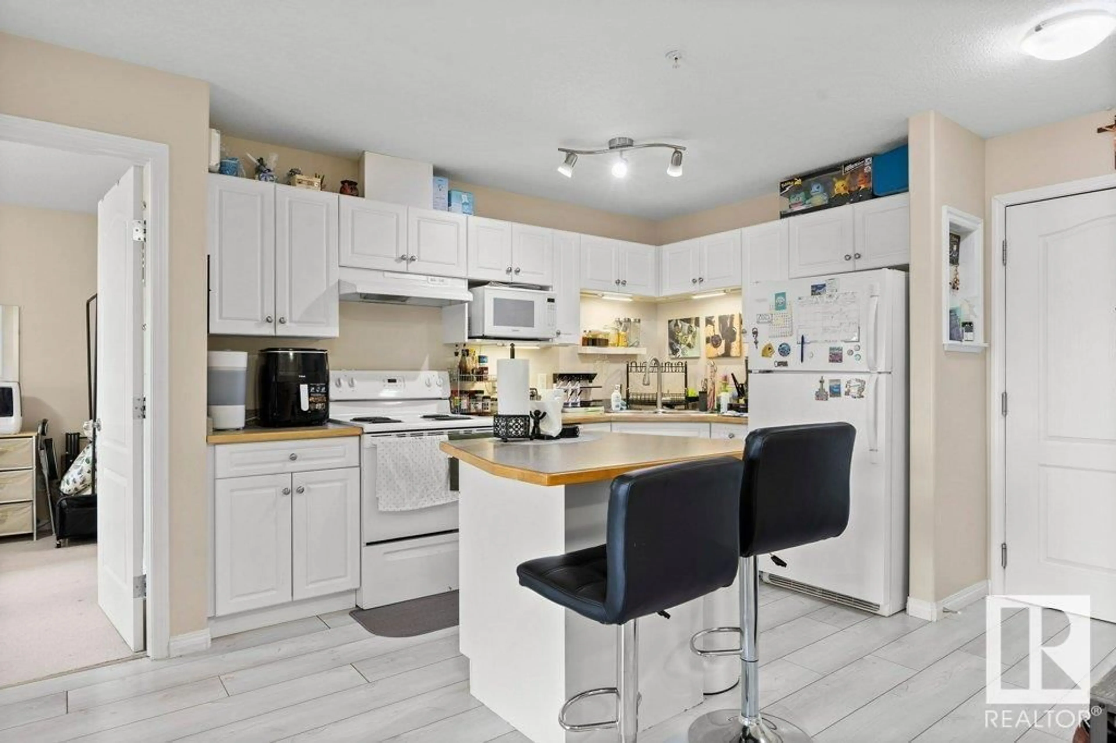 Open concept kitchen, ceramic/tile floor for #330 - 7511 171 ST, Edmonton Alberta T5T6S7