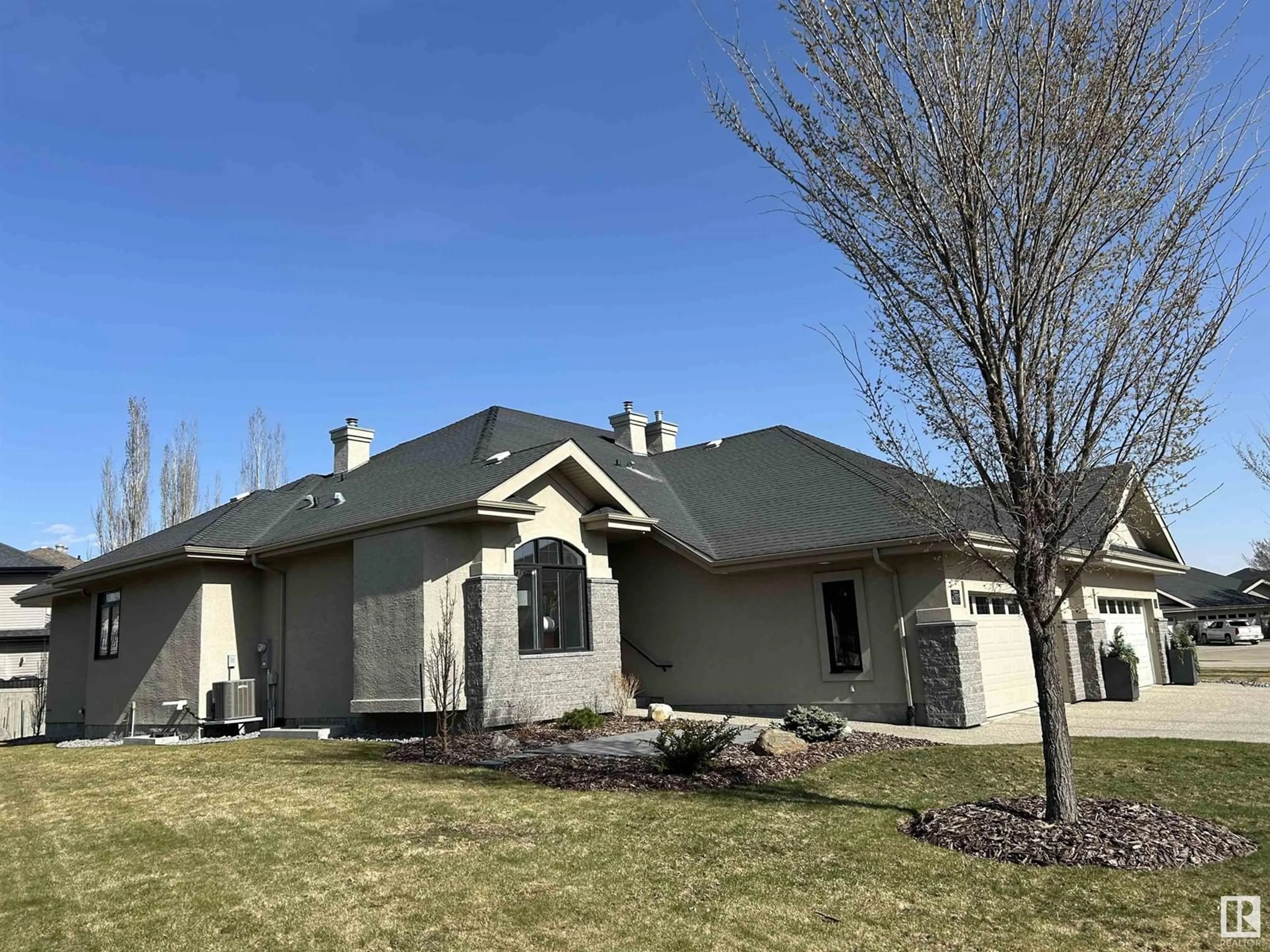 Home with vinyl exterior material, street for 6207 MAYNARD PT, Edmonton Alberta T6R0H9