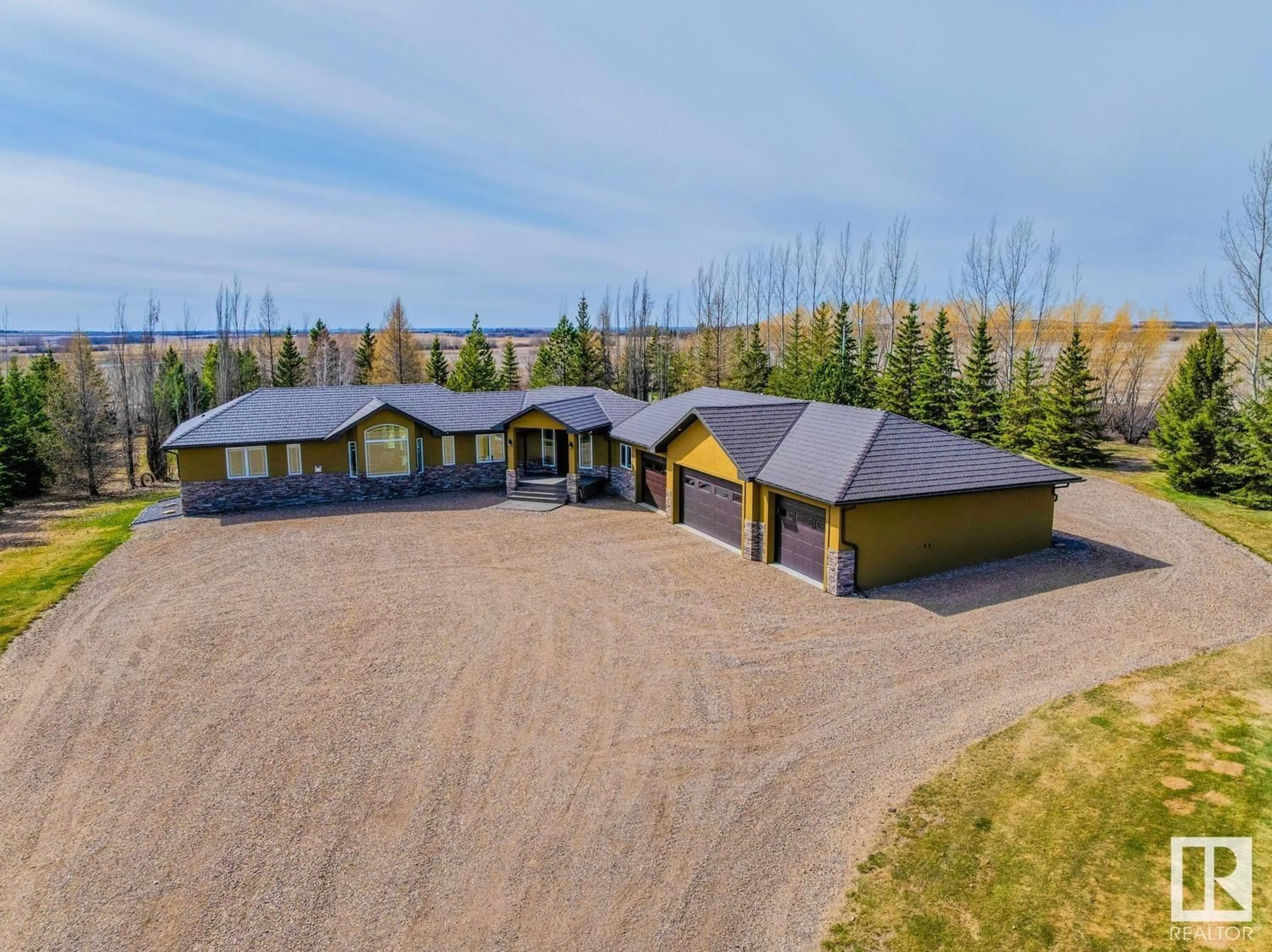A pic from outside/outdoor area/front of a property/back of a property/a pic from drone, building for 52426 RGE RD 134, Rural Minburn County Alberta T0B2S0