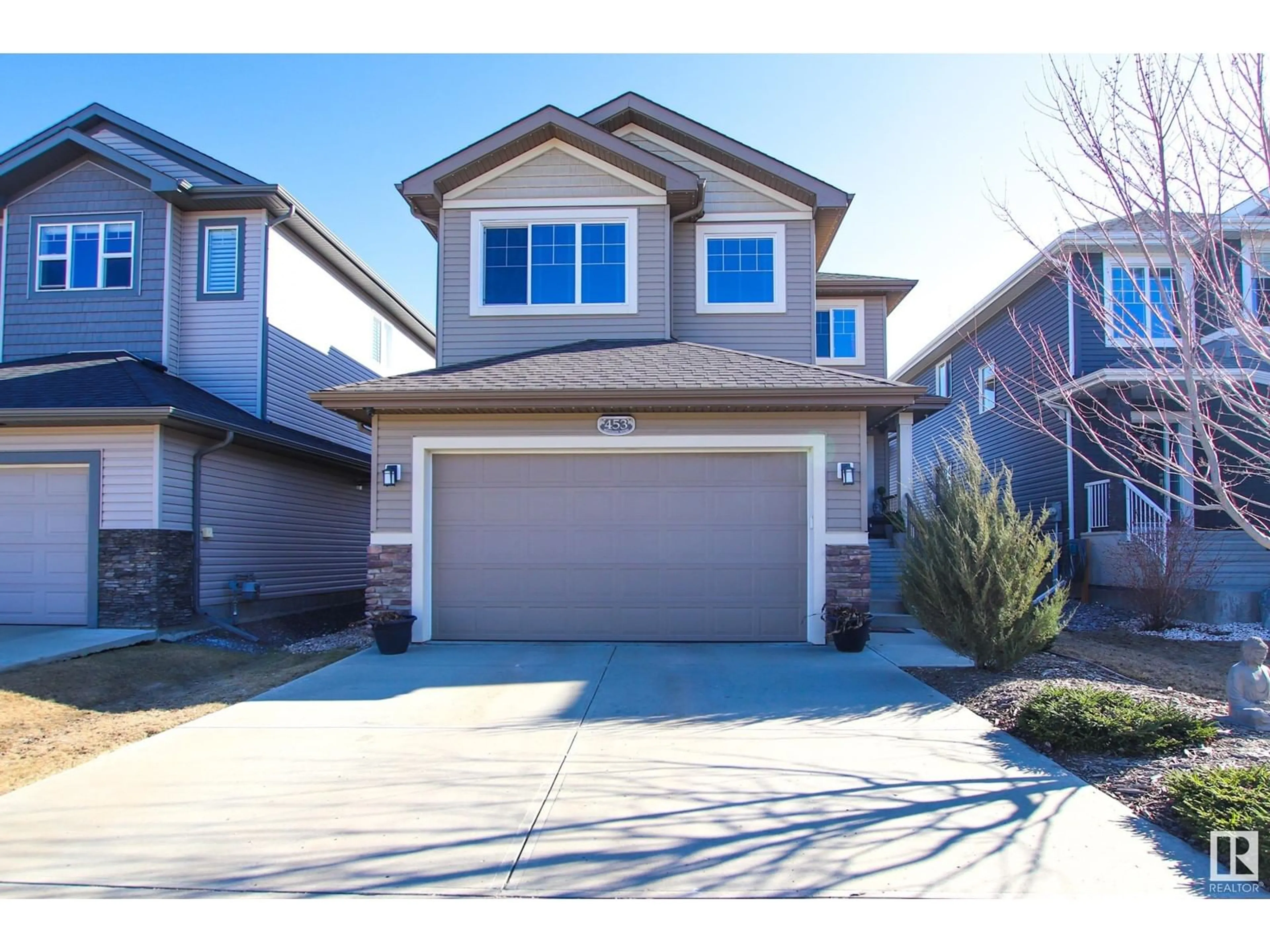 Home with vinyl exterior material, street for 453 REYNALDS WD, Leduc Alberta T9E1A7