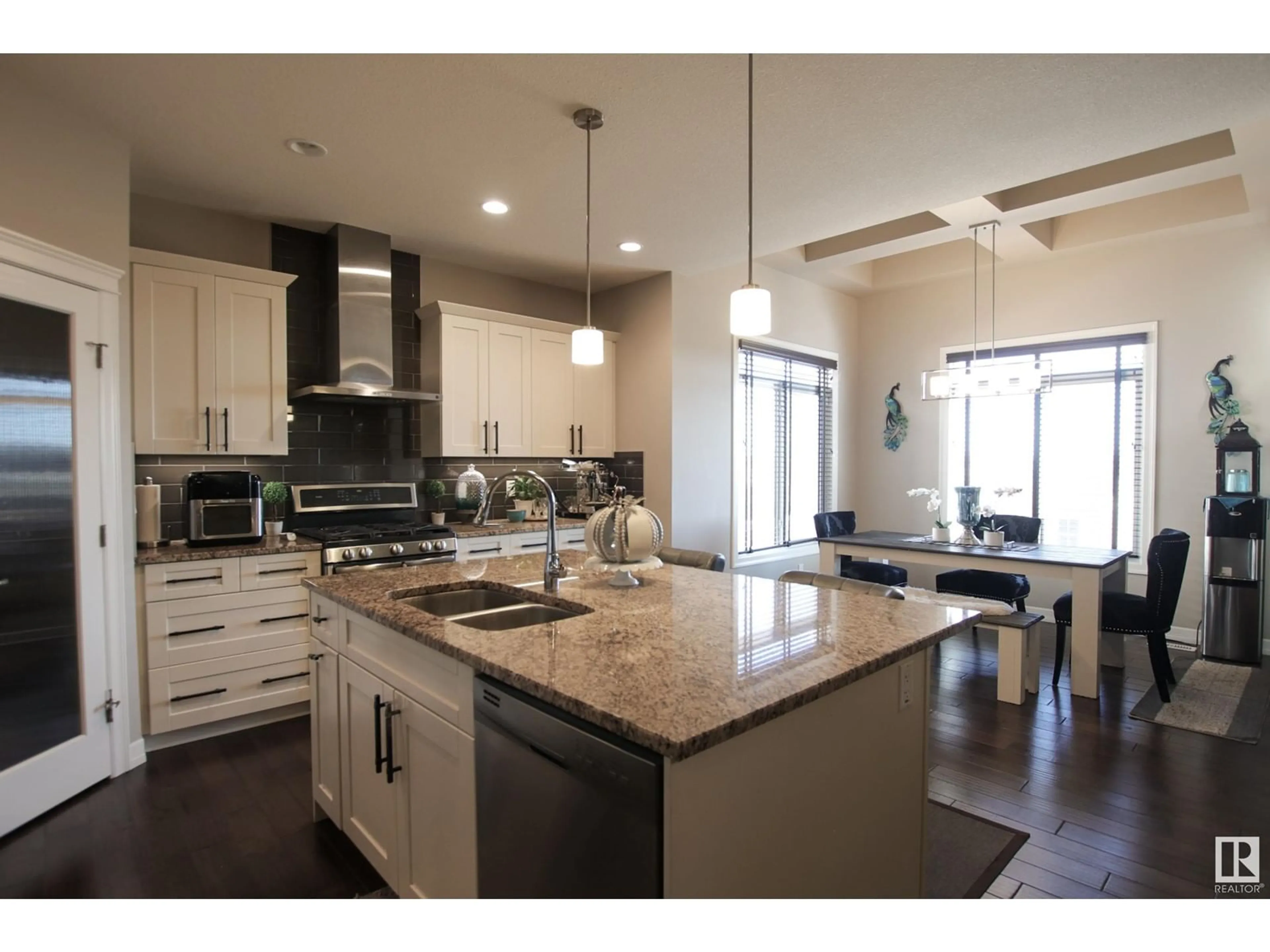 Open concept kitchen, ceramic/tile floor for 453 REYNALDS WD, Leduc Alberta T9E1A7