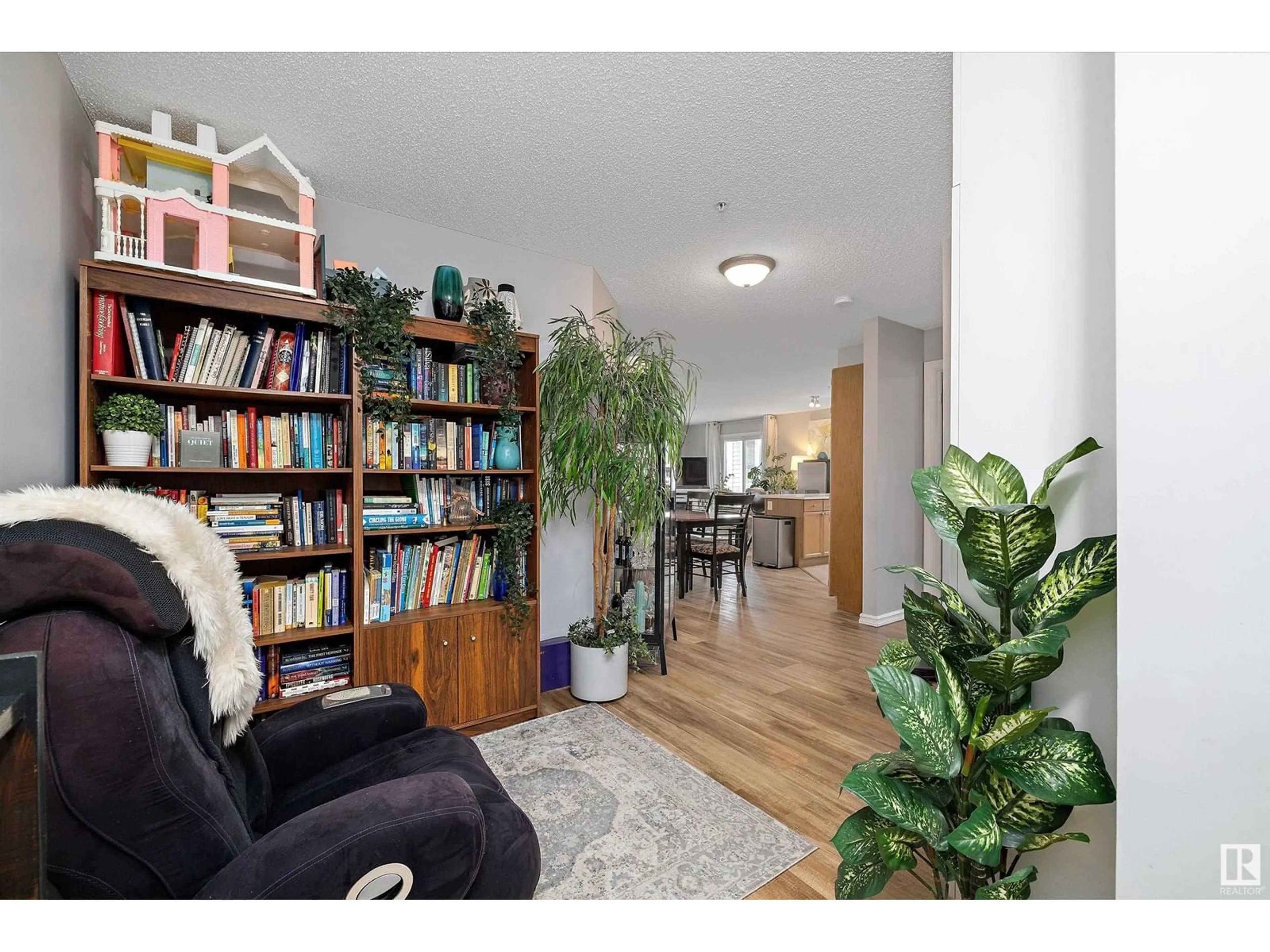 Living room with furniture, wood/laminate floor for #201 - 4407 23 ST, Edmonton Alberta T6T0B6
