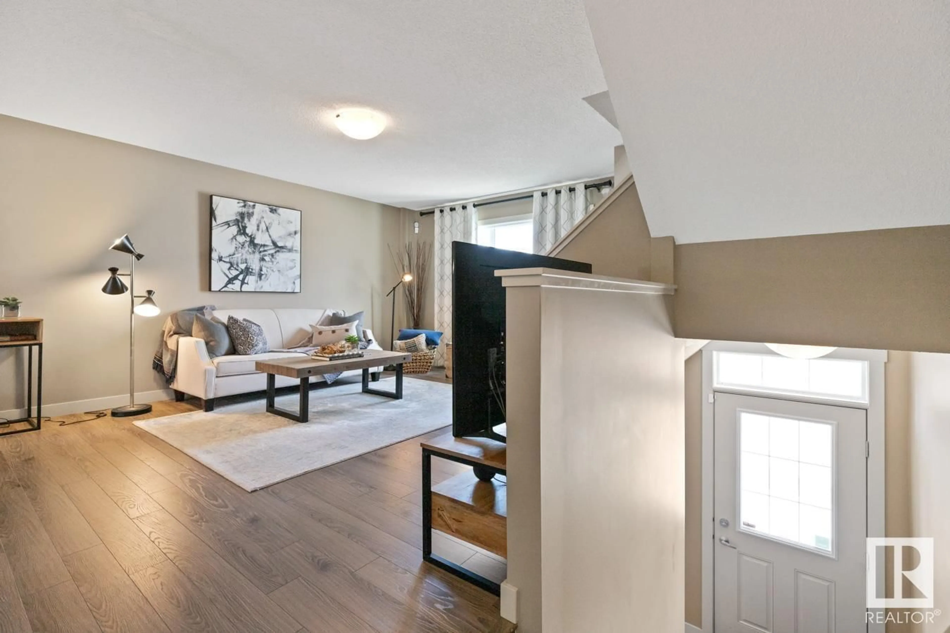 Living room with furniture, unknown for #9 - 1391 STARLING DR, Edmonton Alberta T5S0L3