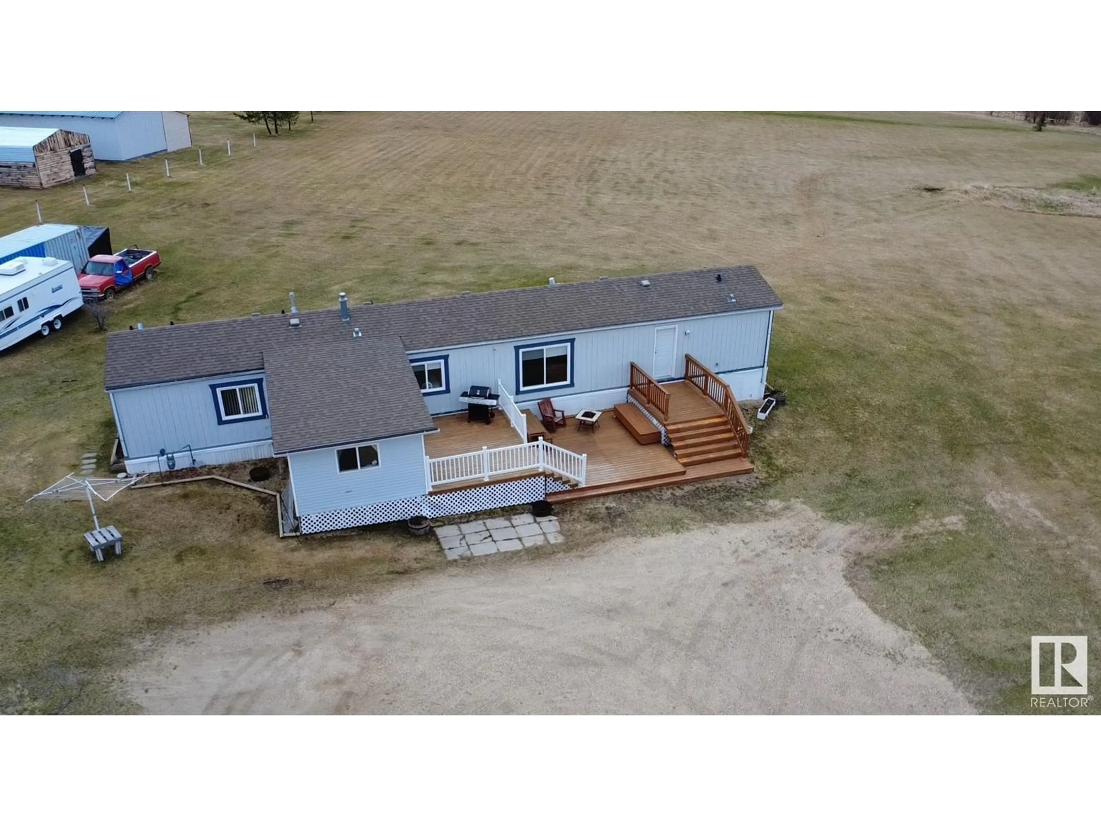A pic from outside/outdoor area/front of a property/back of a property/a pic from drone, building for 9 - 49410 RGE ROAD 81, Rural Brazeau County Alberta T7A1J8