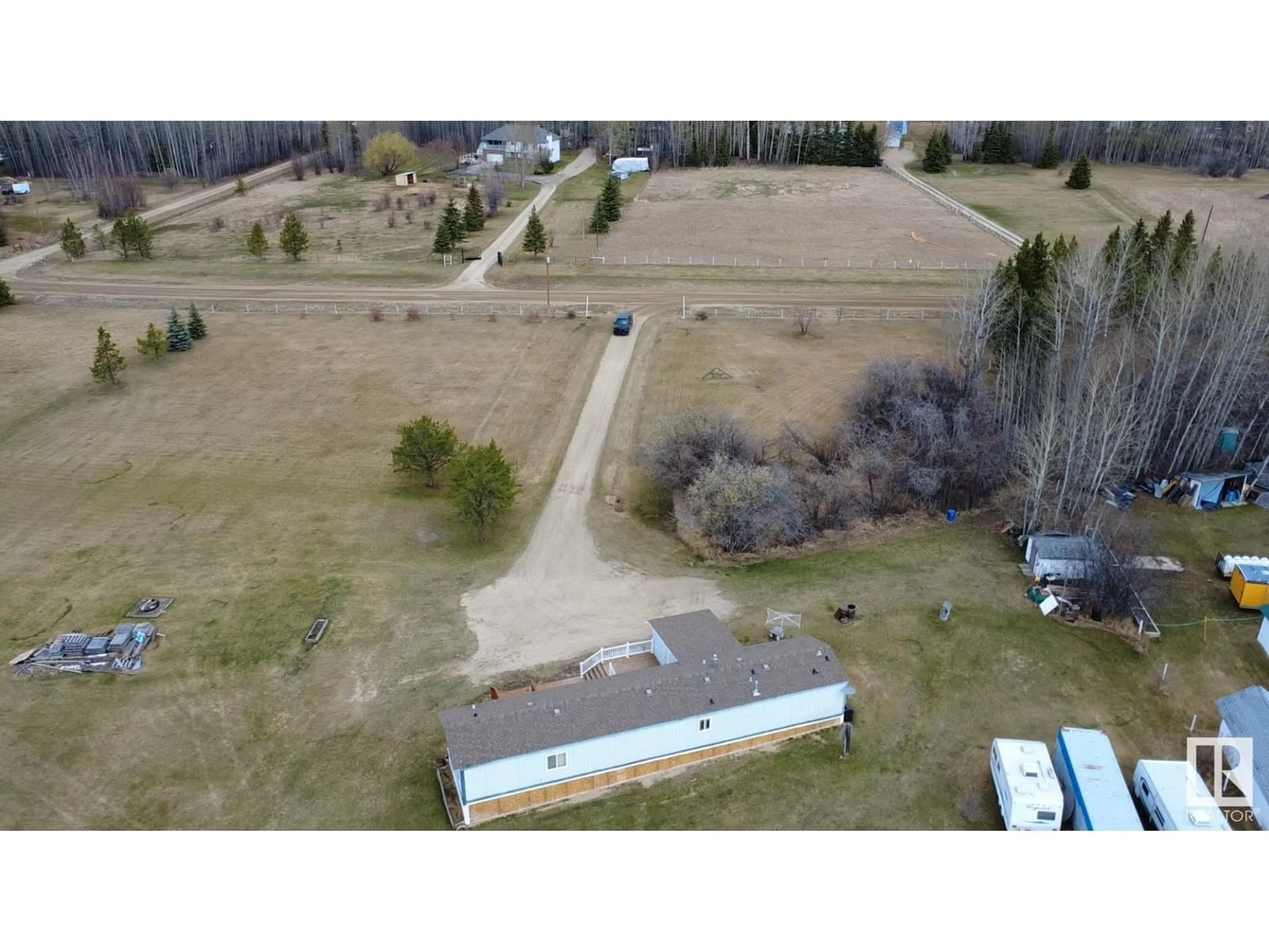 A pic from outside/outdoor area/front of a property/back of a property/a pic from drone, building for 9 - 49410 RGE ROAD 81, Rural Brazeau County Alberta T7A1J8