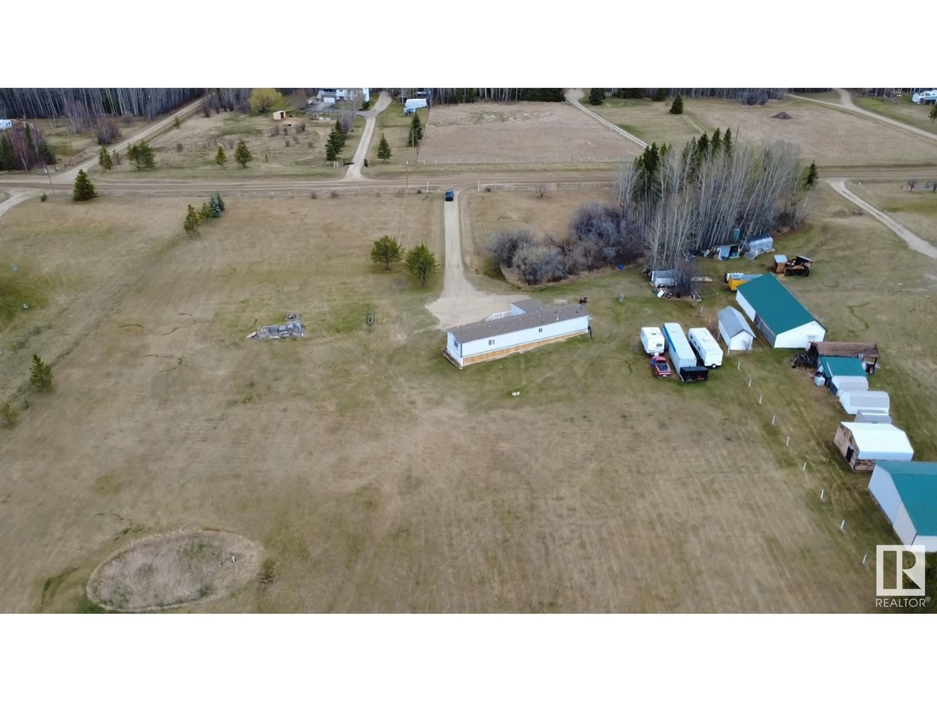 A pic from outside/outdoor area/front of a property/back of a property/a pic from drone, building for 9 - 49410 RGE ROAD 81, Rural Brazeau County Alberta T7A1J8