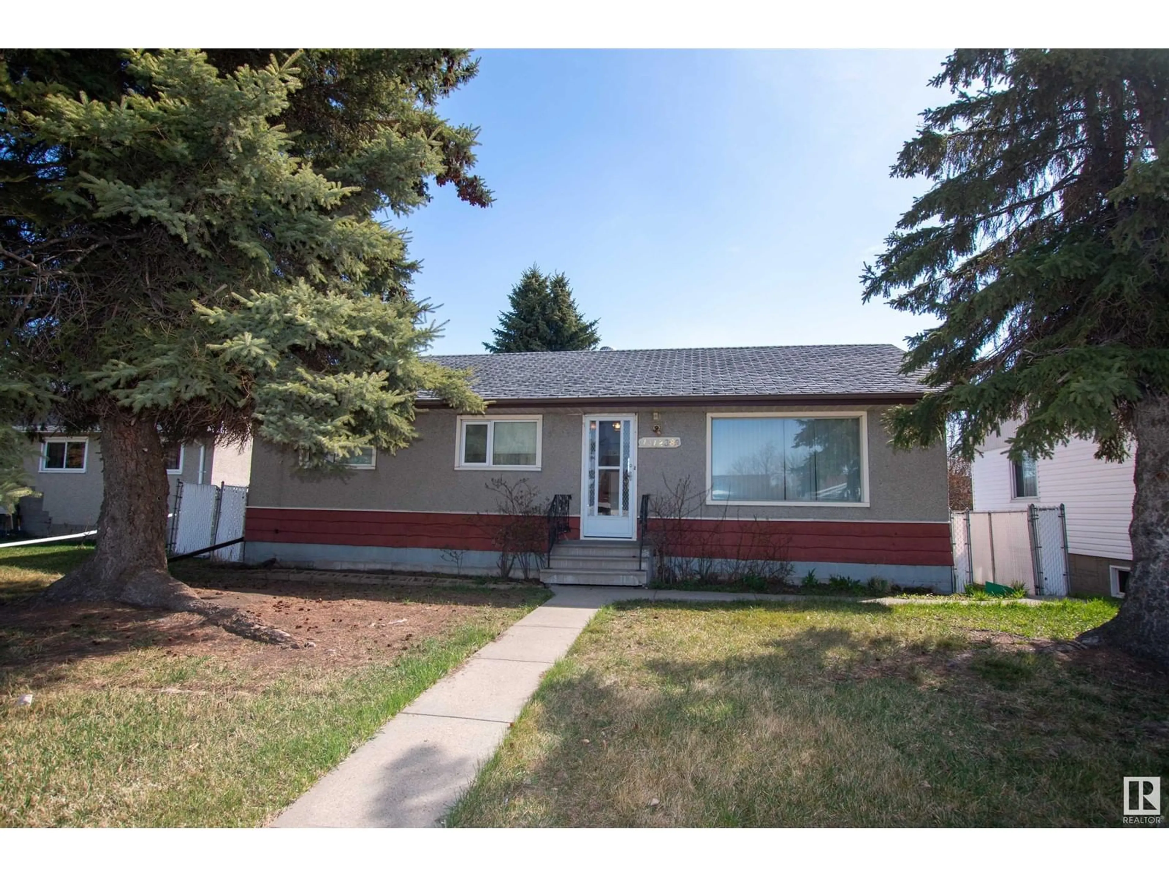 Home with vinyl exterior material, street for NW - 13123 85 ST, Edmonton Alberta T5E2Z5