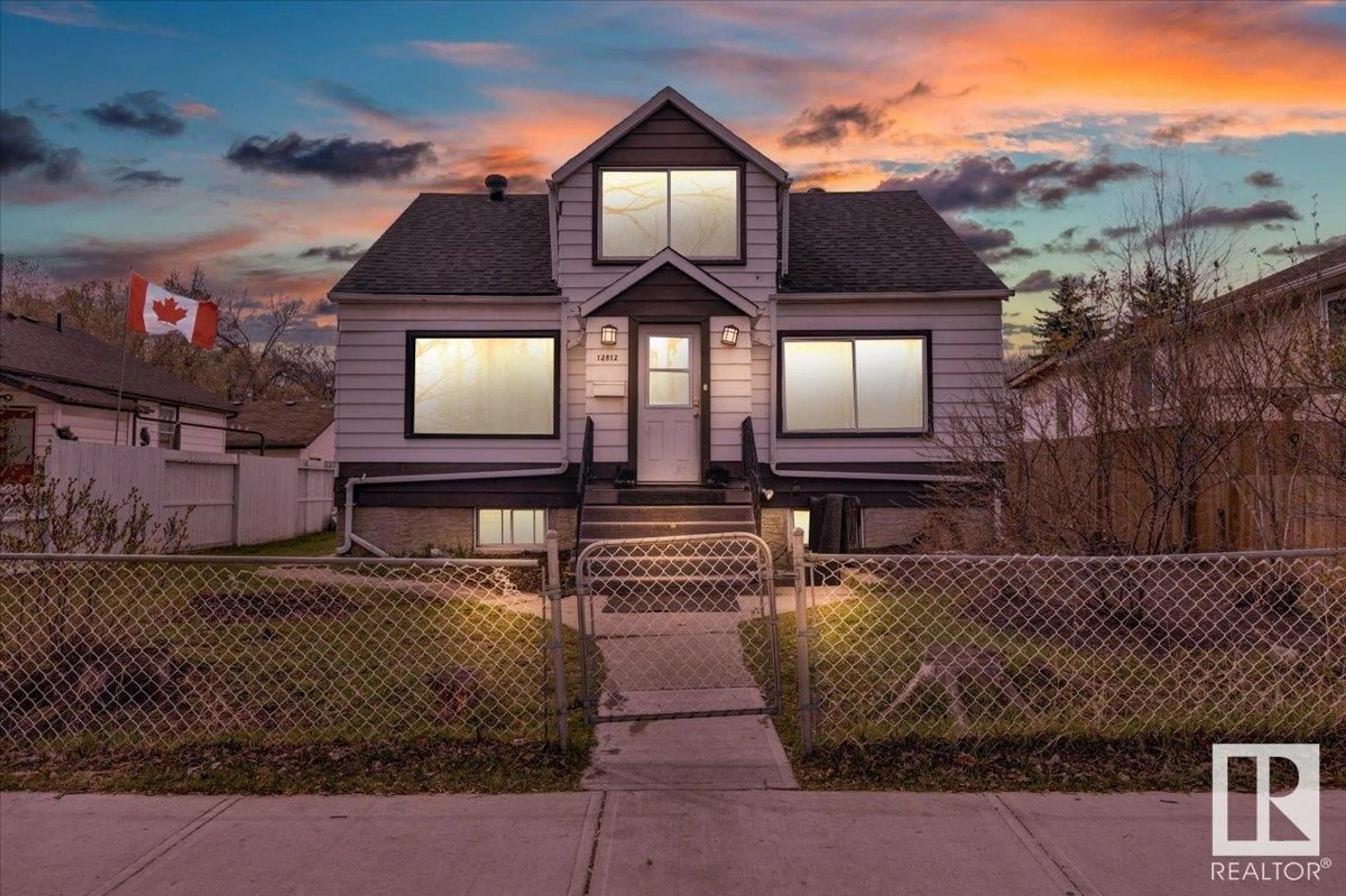 Home with vinyl exterior material, street for NW - 12812 120 ST, Edmonton Alberta T5E5N6