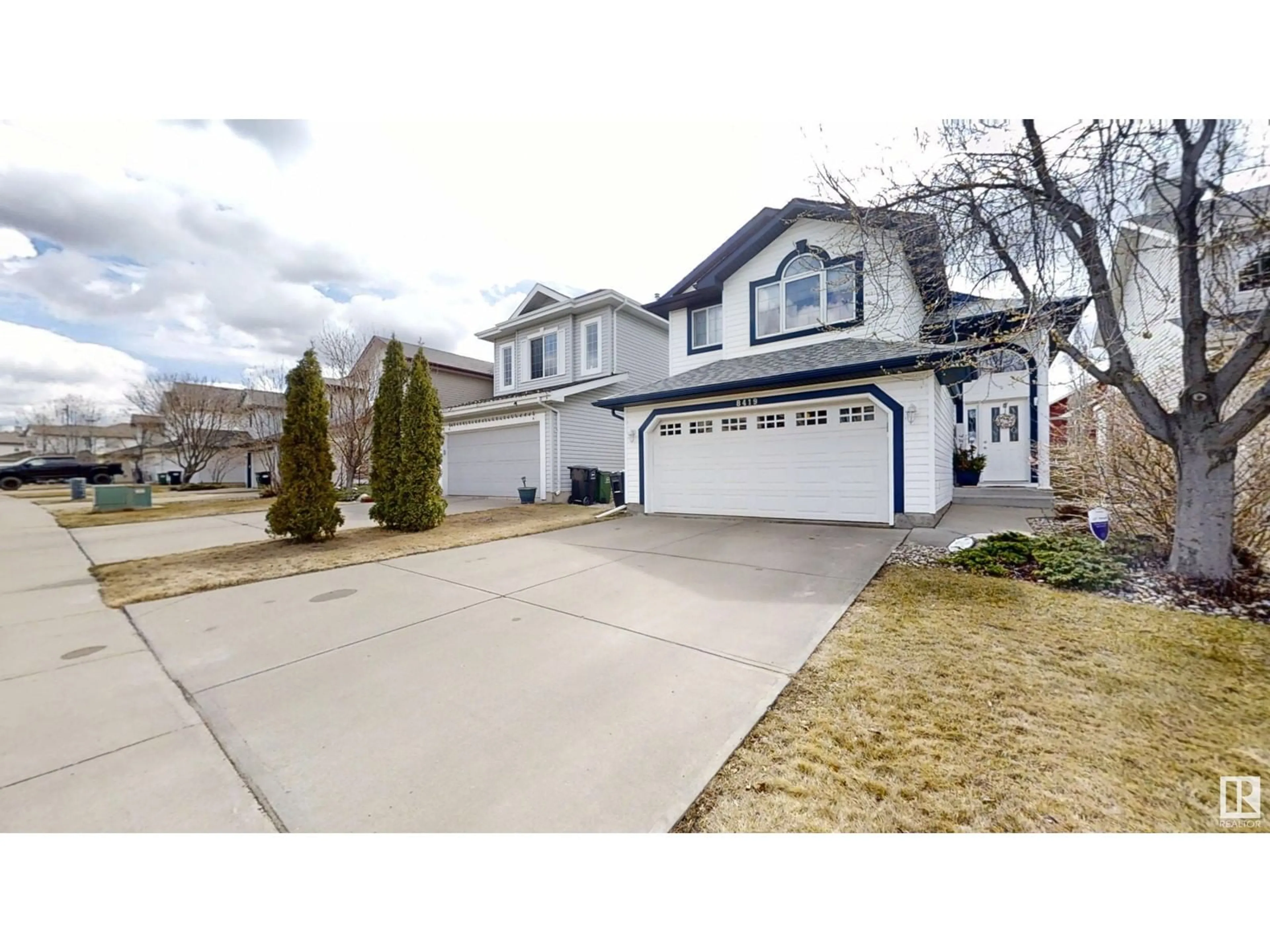 Home with vinyl exterior material, street for 8419 6 AV, Edmonton Alberta T6X1J1