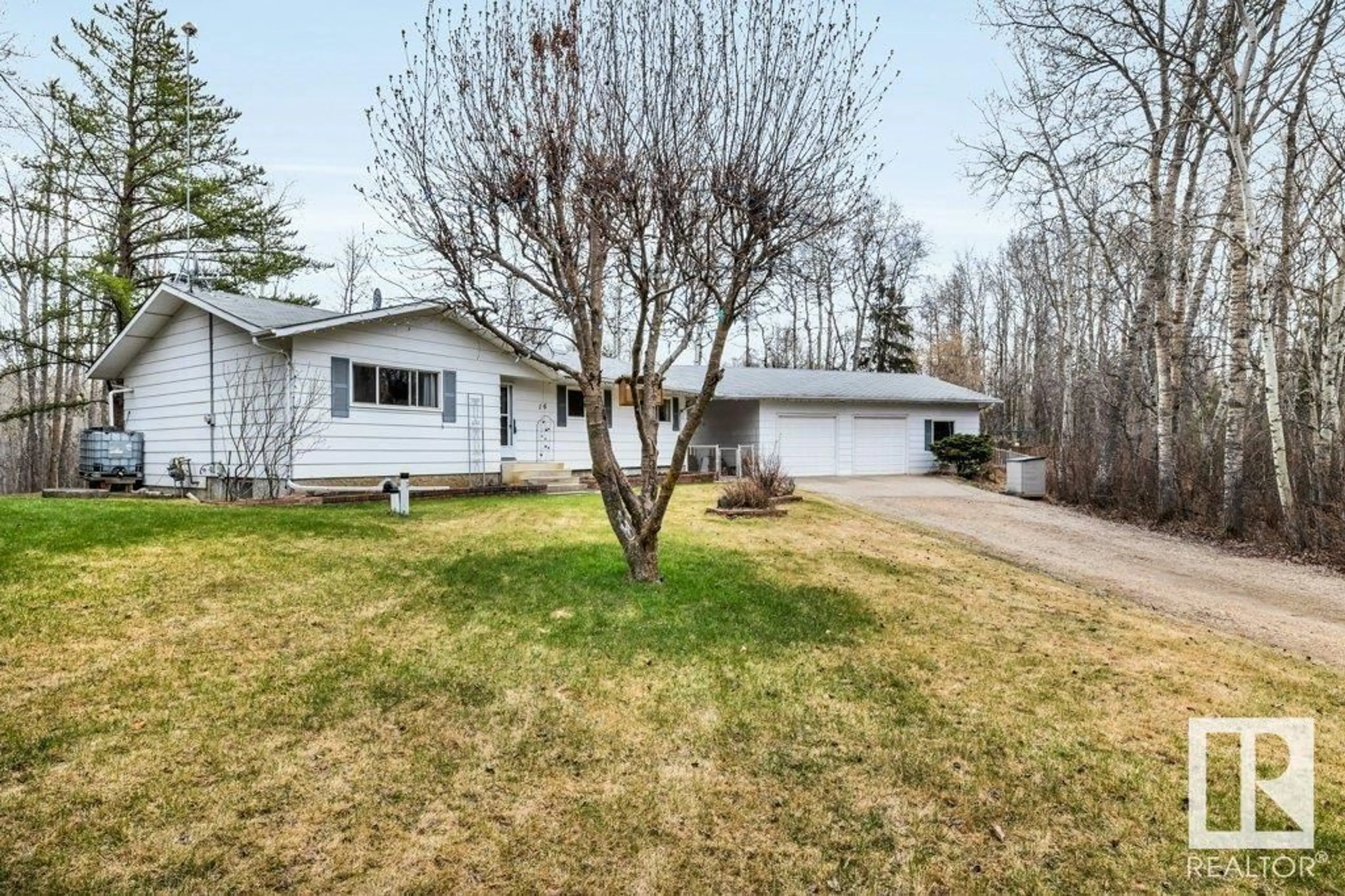 A pic from outside/outdoor area/front of a property/back of a property/a pic from drone, street for 16-26213 TWP RD 512, Rural Parkland County Alberta T7Y1C6