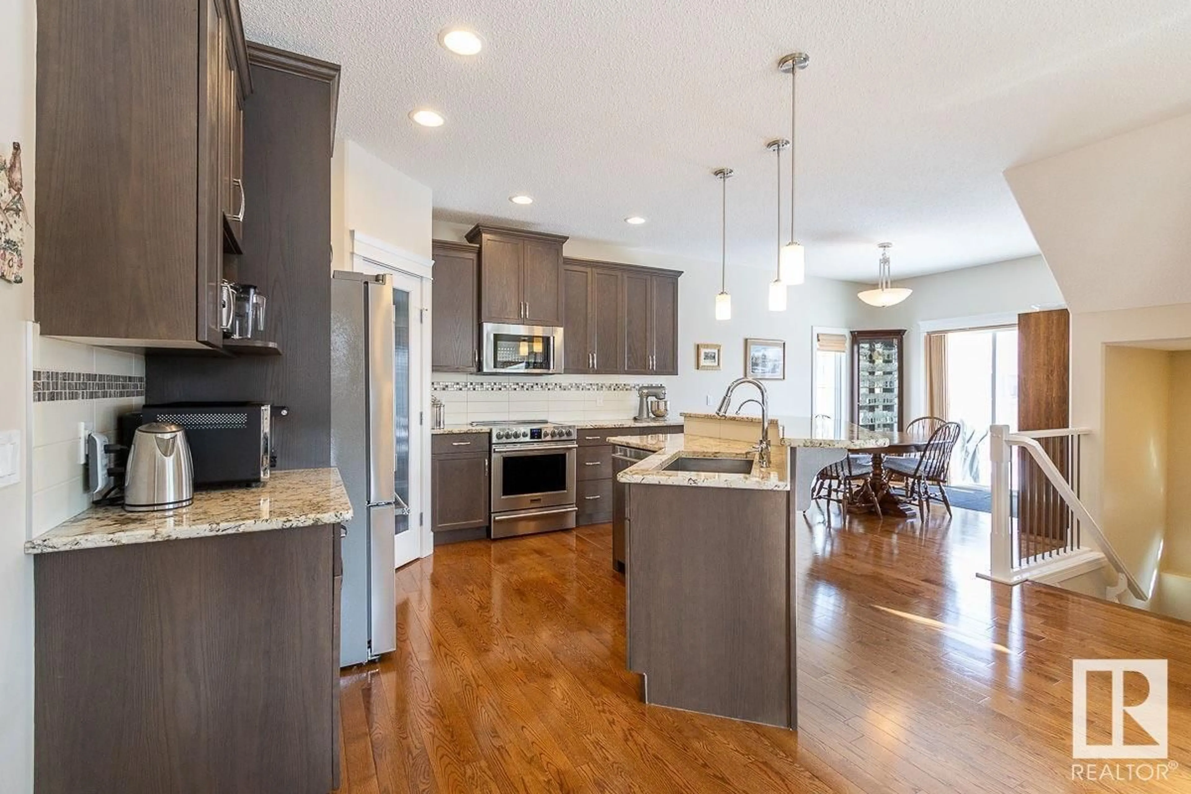 Open concept kitchen, unknown for SW - 5603 18 AVE, Edmonton Alberta T6X1P8