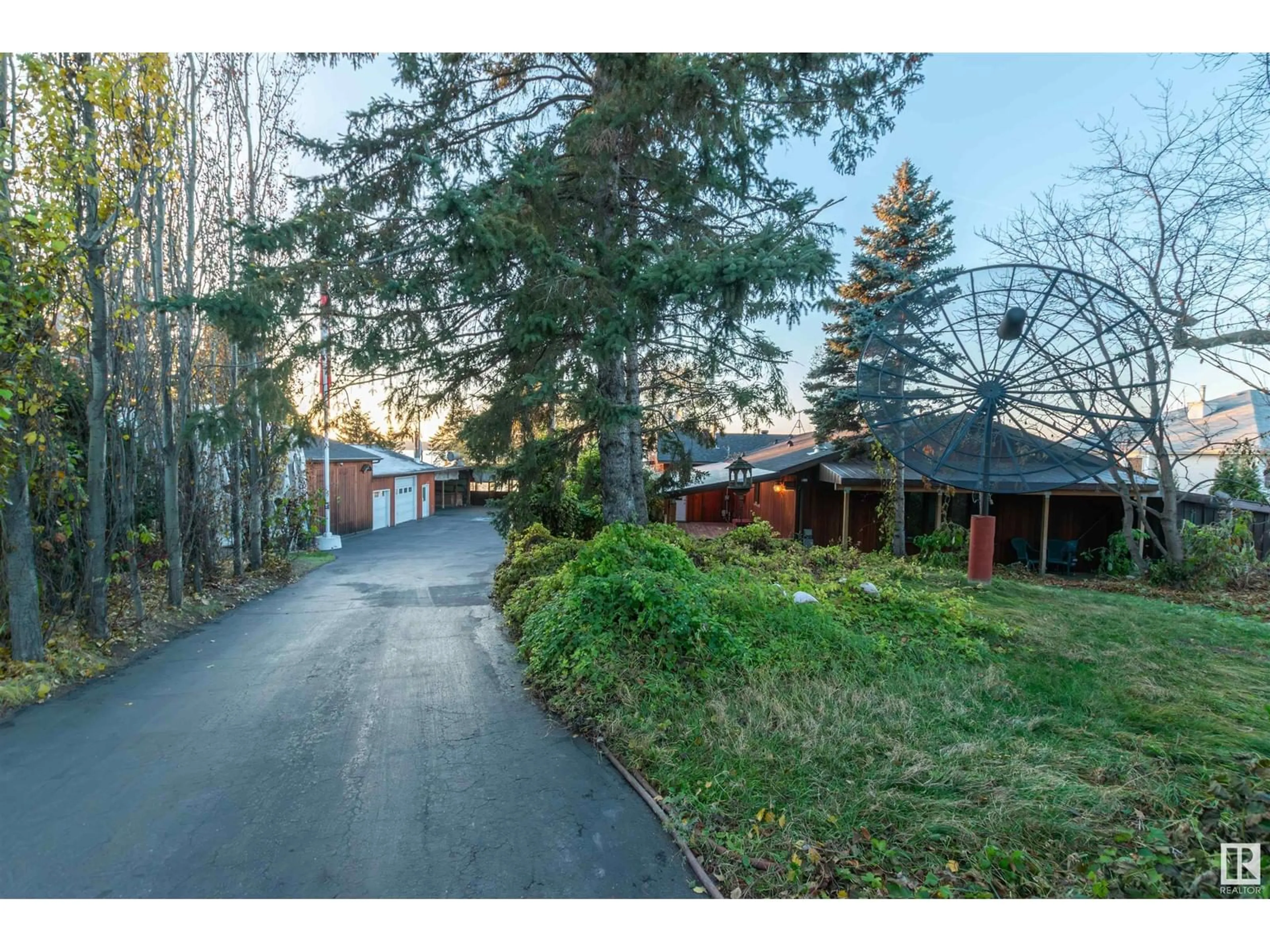 A pic from outside/outdoor area/front of a property/back of a property/a pic from drone, street for 78 - 52343 RGE ROAD 211, Rural Strathcona County Alberta T8G1A6