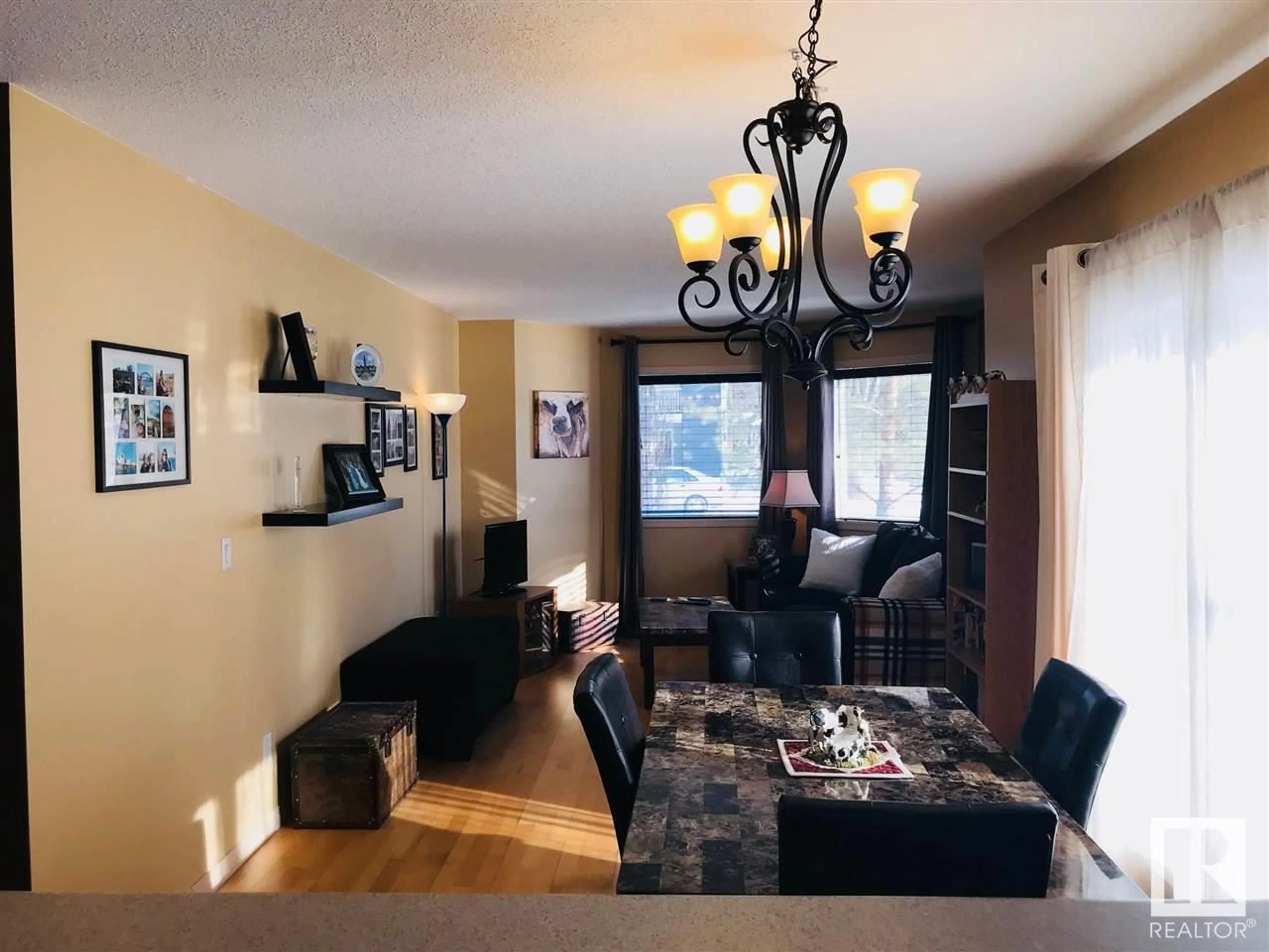 Living room with furniture, wood/laminate floor for #101 - 11408 108 AV, Edmonton Alberta T5H4R5