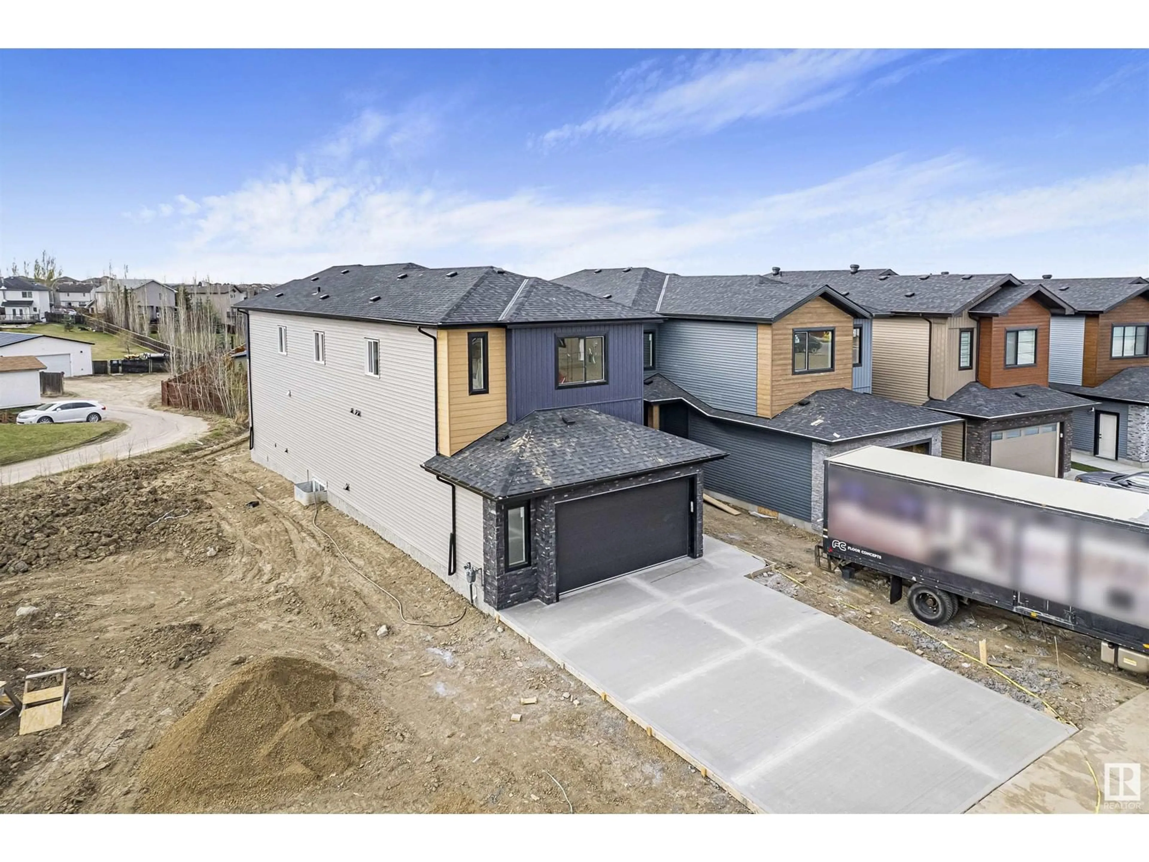 A pic from outside/outdoor area/front of a property/back of a property/a pic from drone, street for 46 GRASSVIEW CR, Spruce Grove Alberta T7X3G1