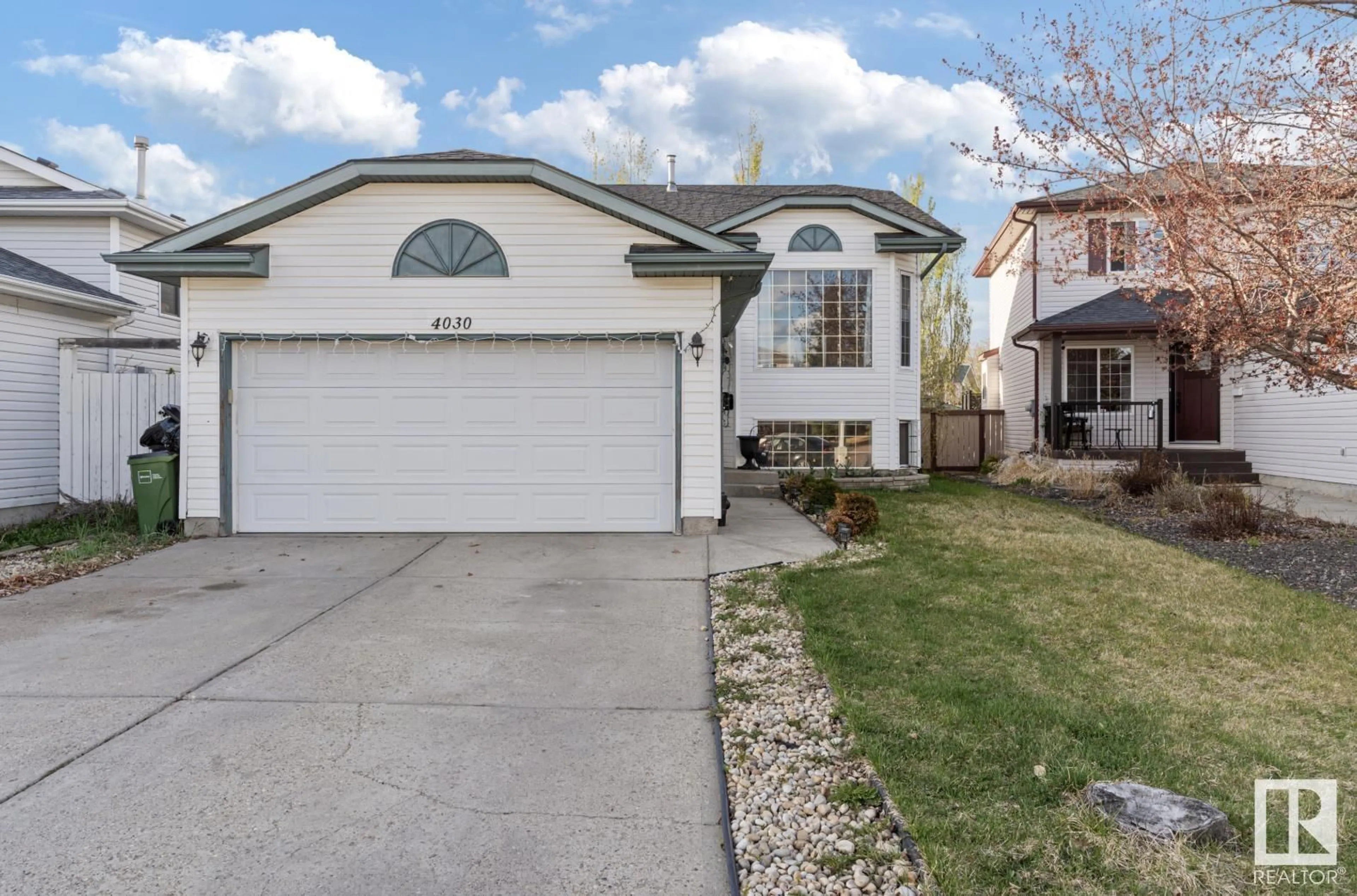 Home with vinyl exterior material, street for 4030 37A AVENUE AVENUE, Edmonton Alberta T6L7A1