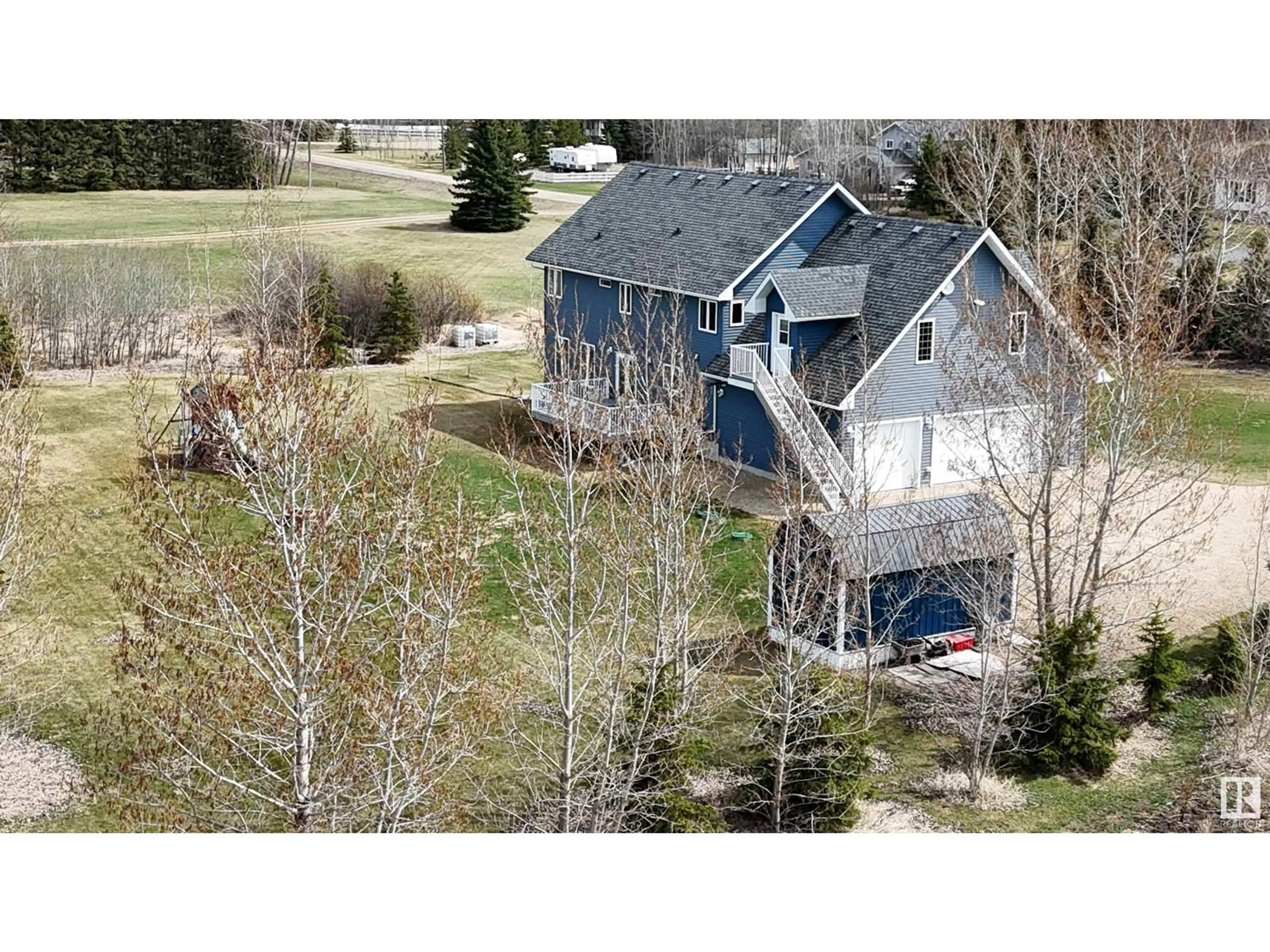 A pic from outside/outdoor area/front of a property/back of a property/a pic from drone, unknown for 51309 - 181 RGE ROAD 225, Rural Strathcona County Alberta T8C1H5