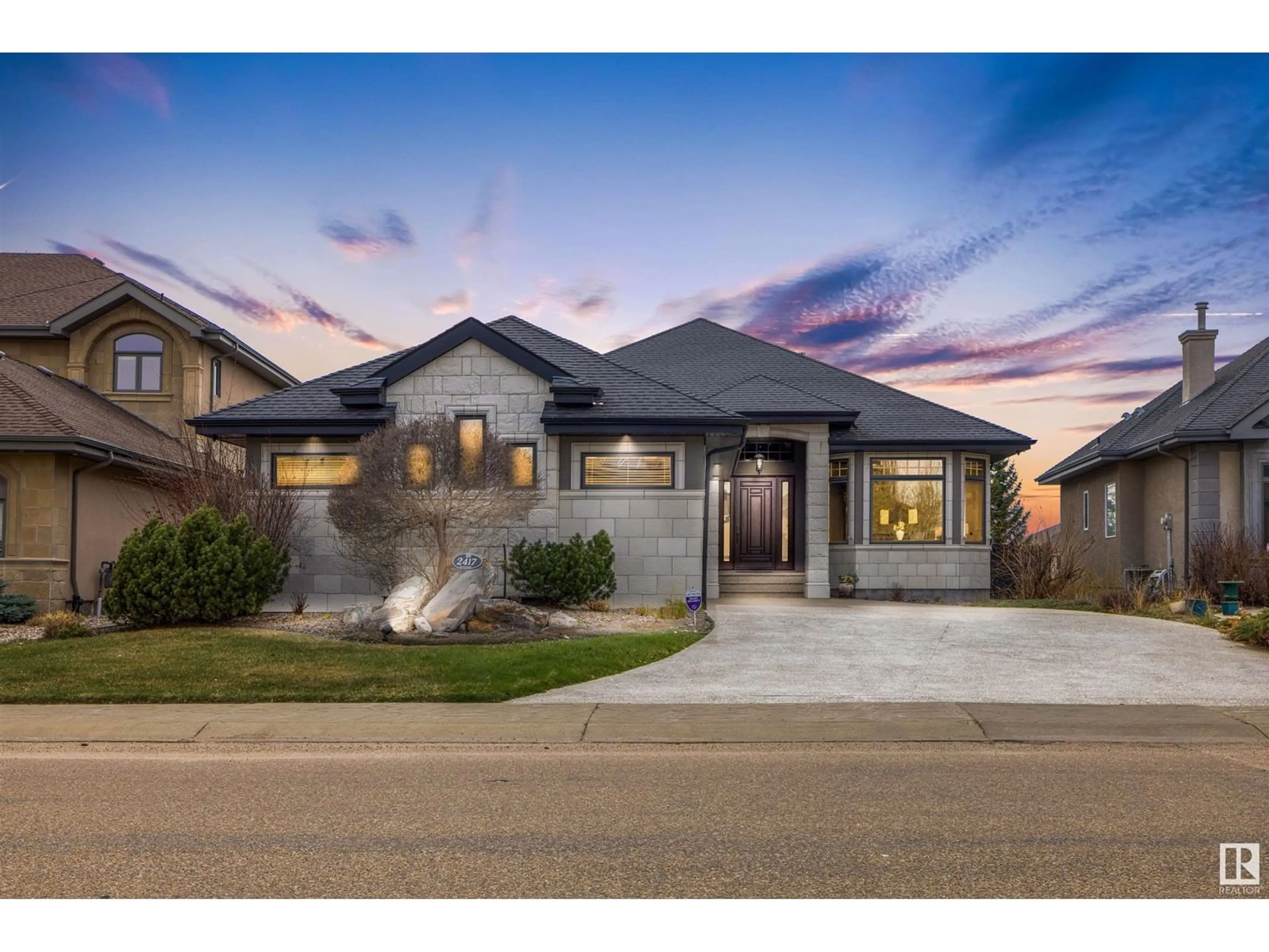 Home with brick exterior material, street for 2417 TEGLER GREEN GR, Edmonton Alberta T6K3K2