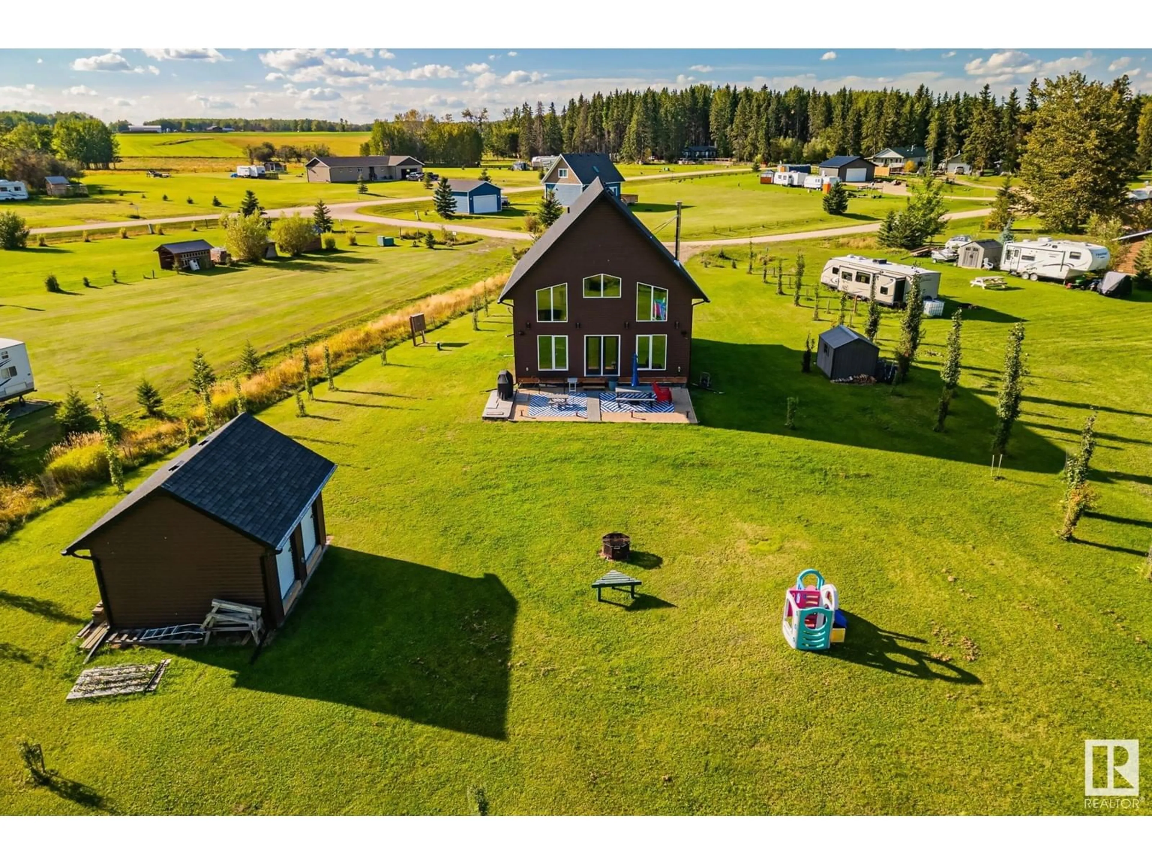 A pic from outside/outdoor area/front of a property/back of a property/a pic from drone, mountain view for 209 - 62002 TWP RD 462 A, Rural Wetaskiwin County Alberta T0C0T0