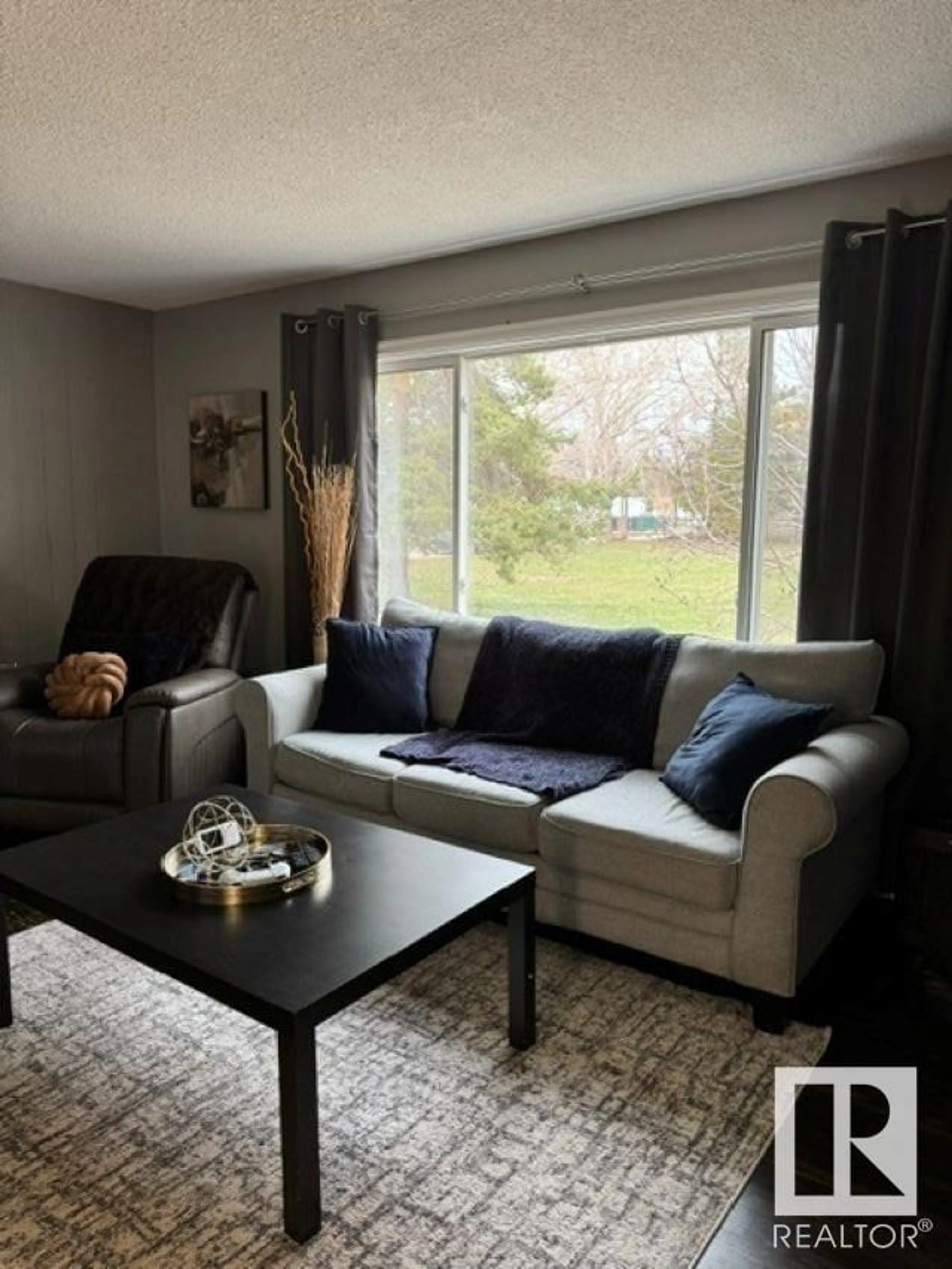 Living room with furniture, wood/laminate floor for 40 GARDEN CR, St. Albert Alberta T8N0W9