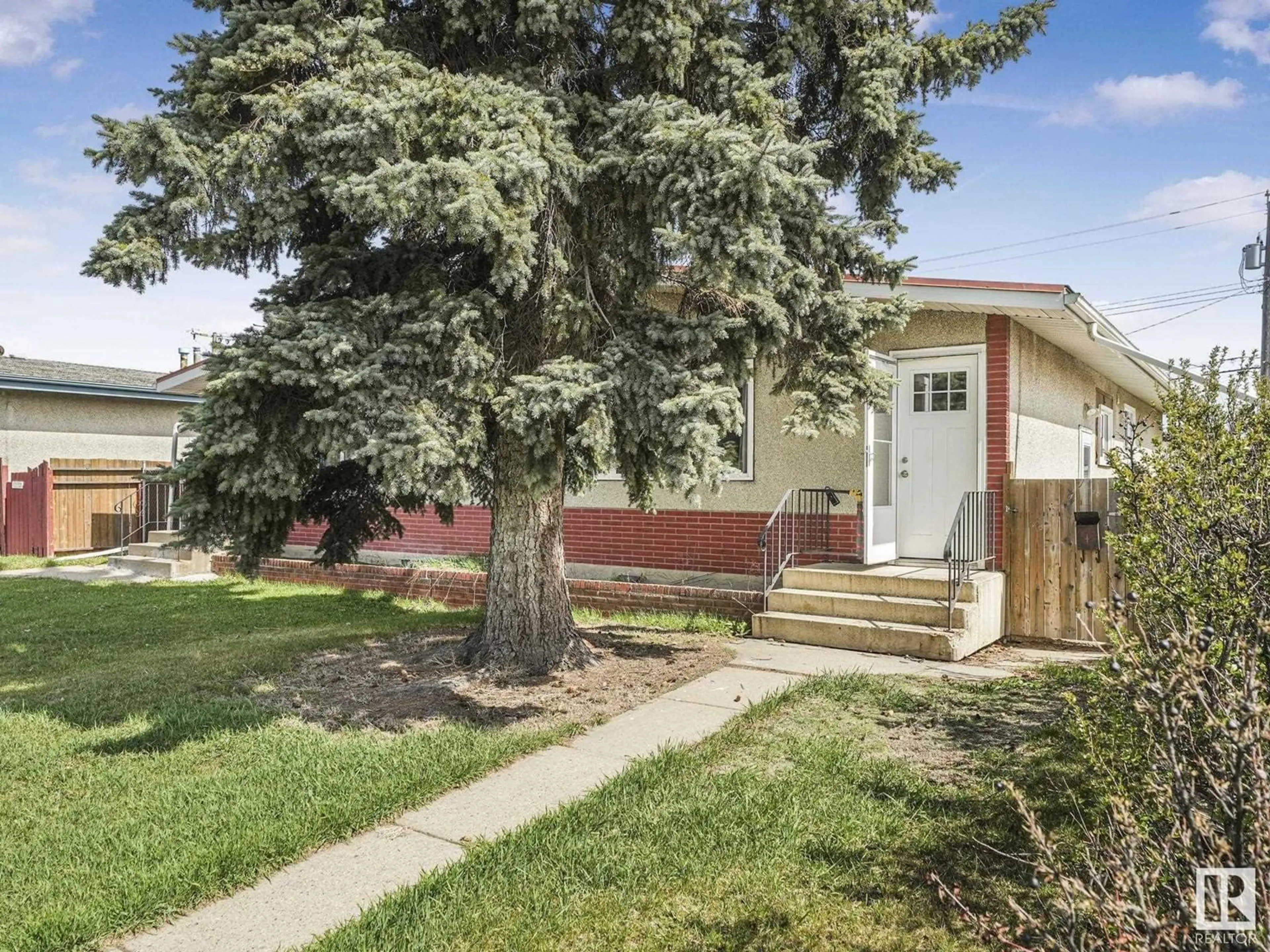 Home with vinyl exterior material, street for NW - 13111 82 ST, Edmonton Alberta T5E2T4