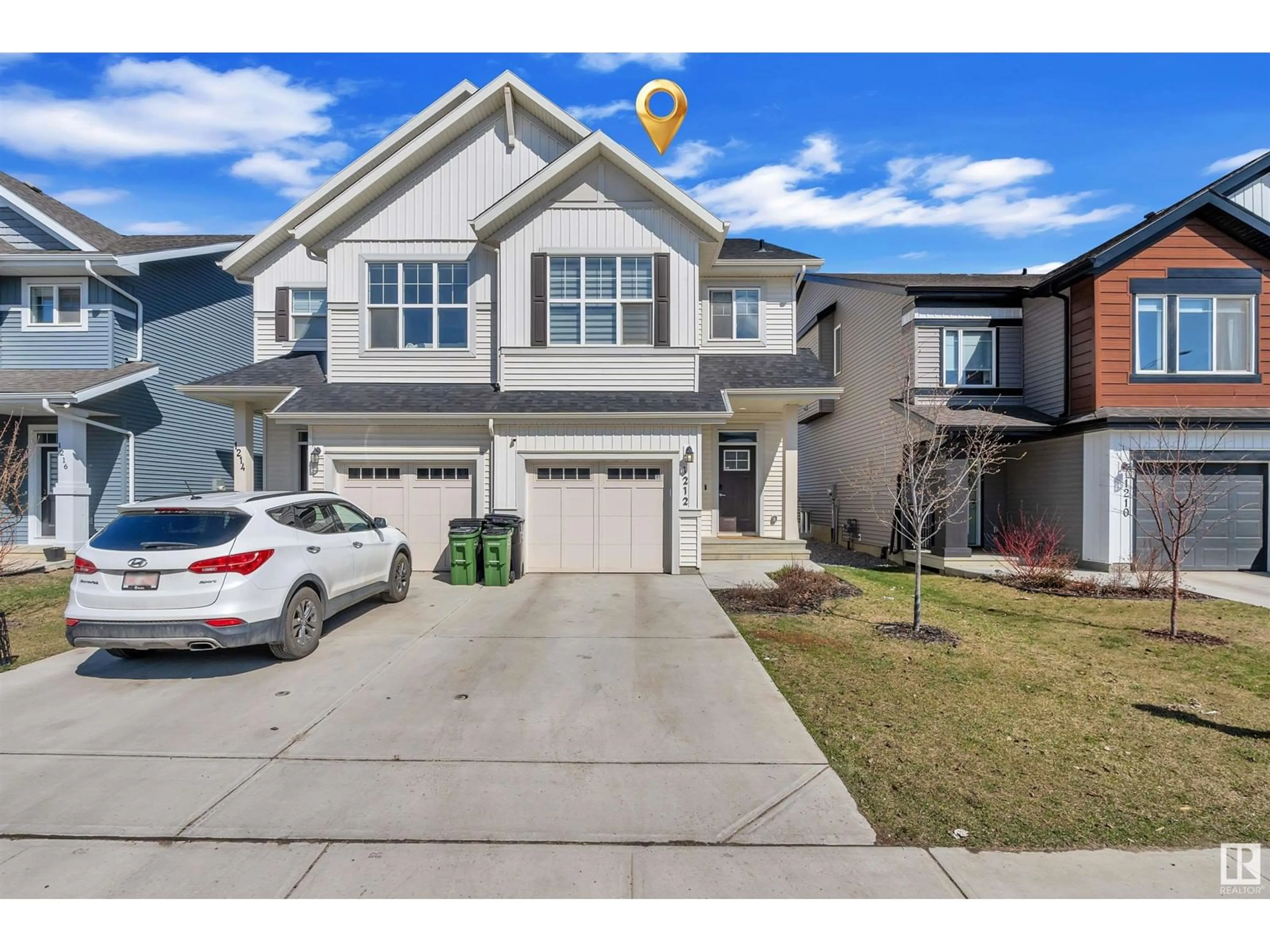 A pic from outside/outdoor area/front of a property/back of a property/a pic from drone, street for SW SW - 1212 PODERSKY WD, Edmonton Alberta T6W4W3