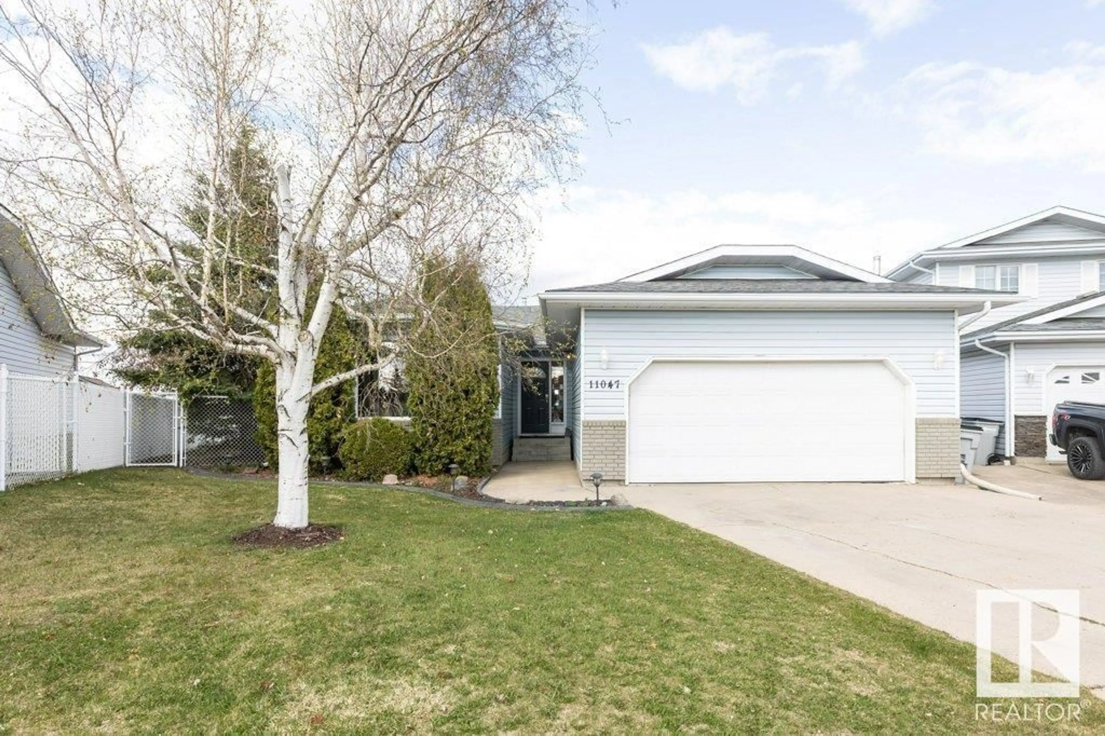 Home with vinyl exterior material, street for 11047 105 ST, Westlock Alberta T7P1E8
