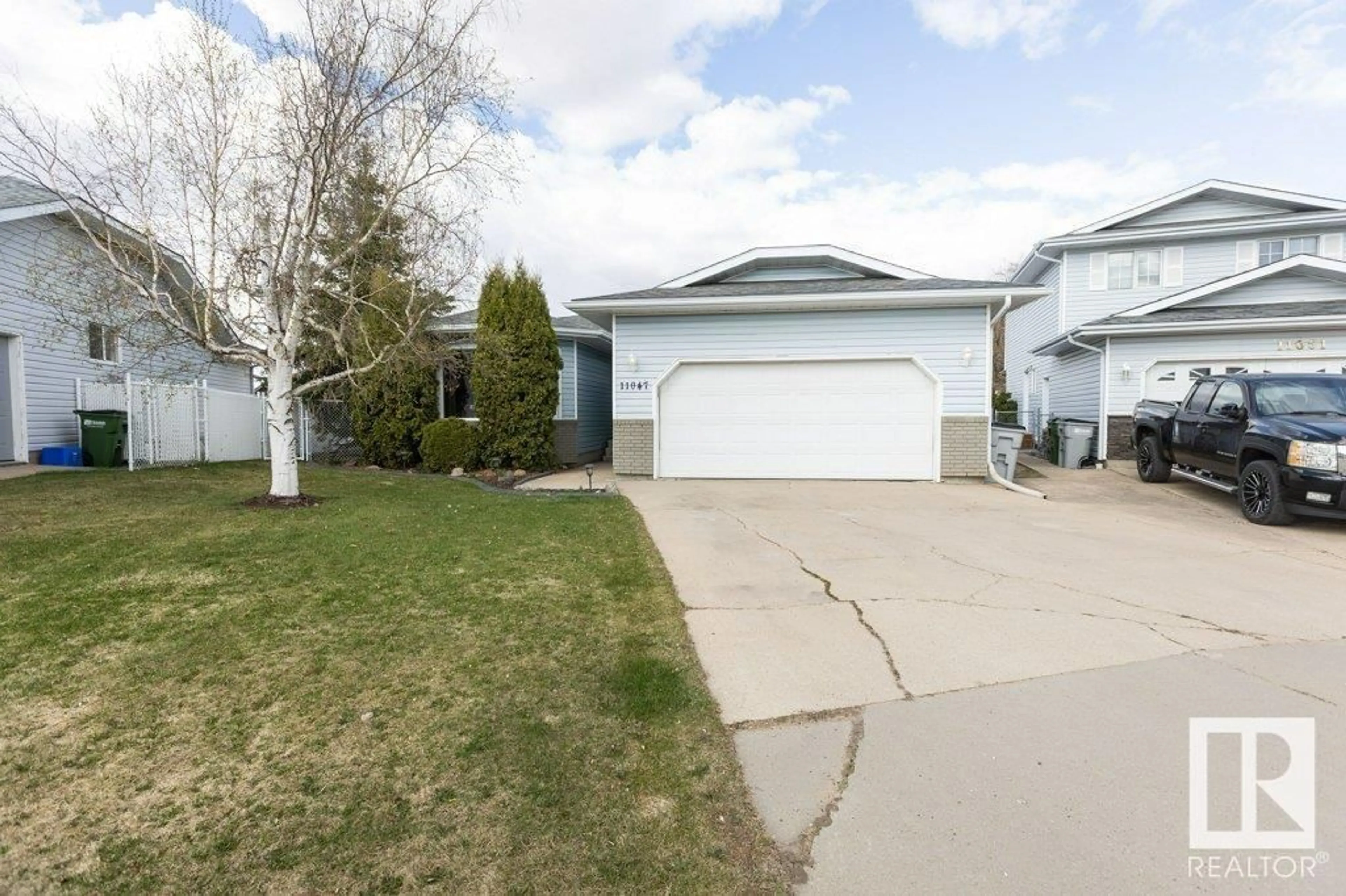 Home with vinyl exterior material, street for 11047 105 ST, Westlock Alberta T7P1E8
