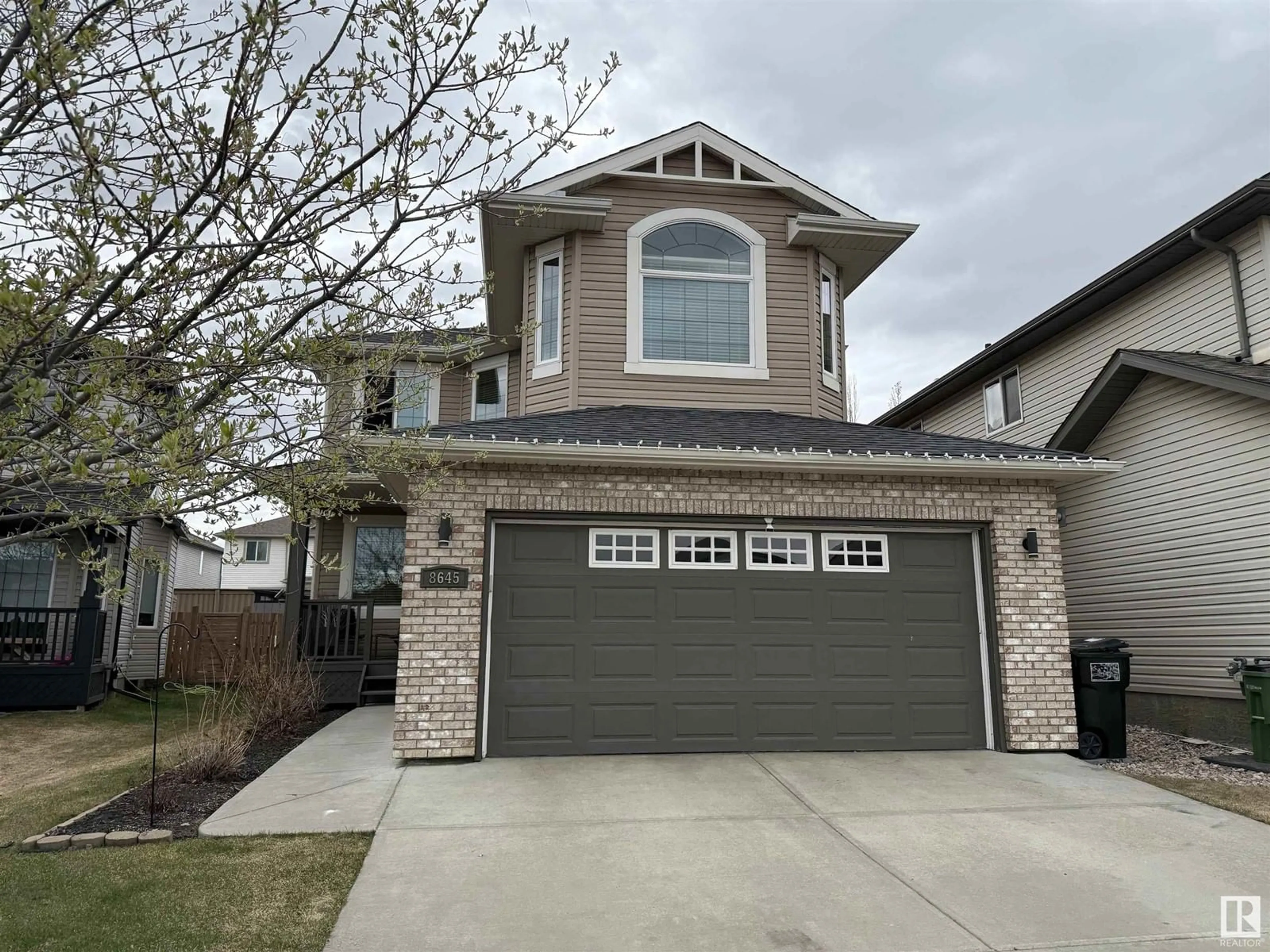 Home with vinyl exterior material, street for 8645 SLOANE CO NW, Edmonton Alberta T6K0K9