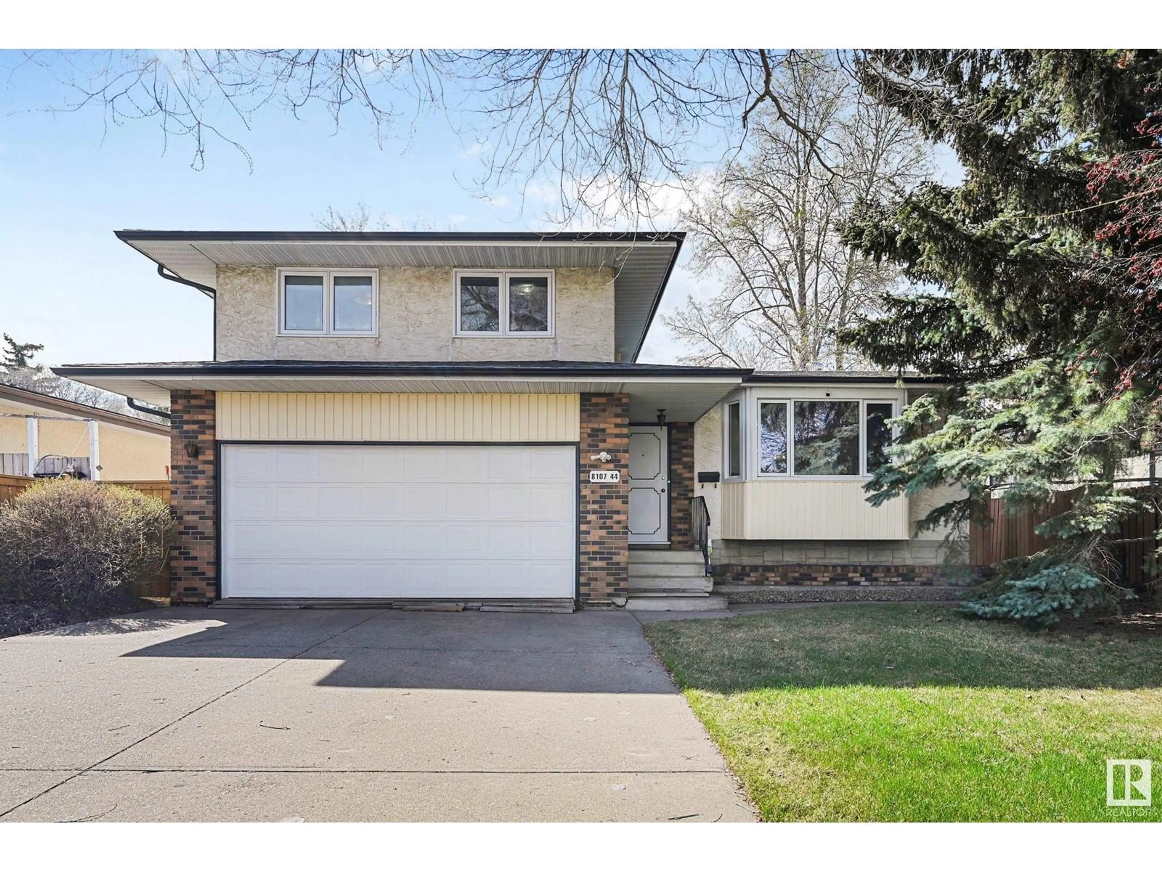 Home with vinyl exterior material, street for 8107 44 AV, Edmonton Alberta T6K0Z3