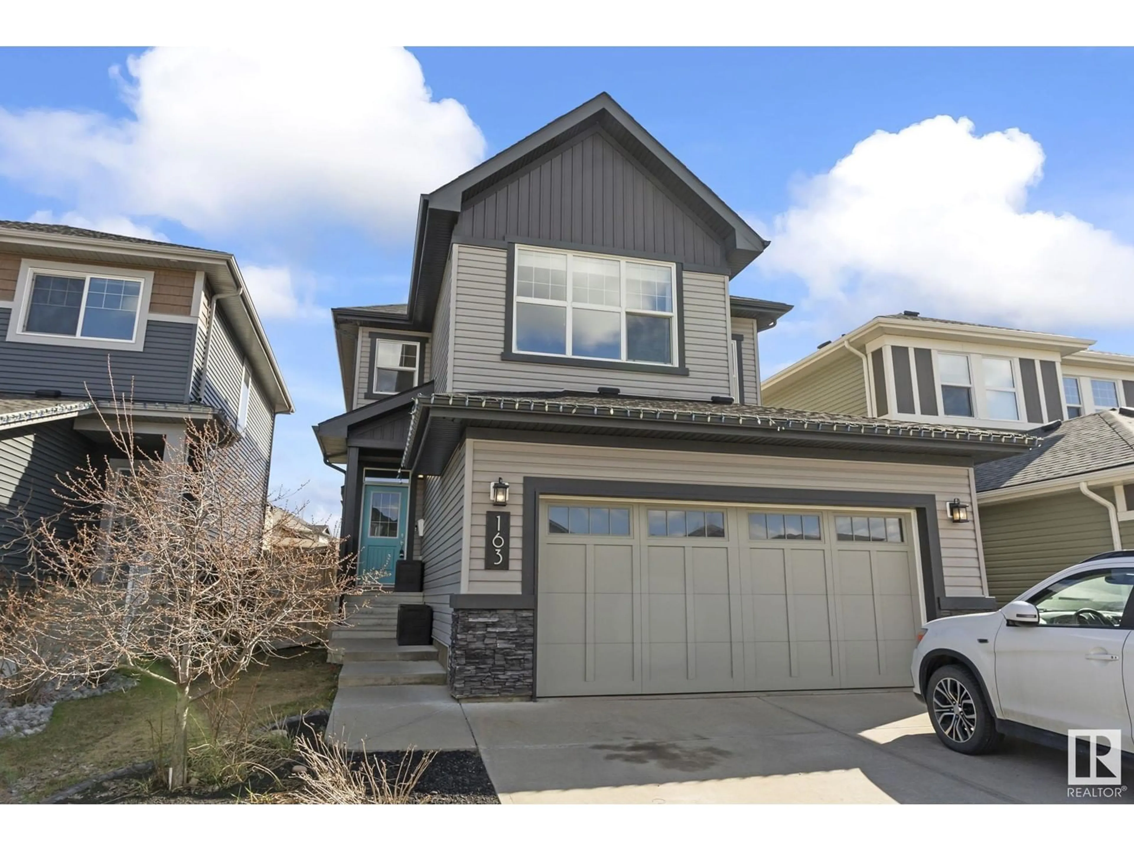 Home with vinyl exterior material, street for 163 HARVEST RIDGE DR, Spruce Grove Alberta T7X0P4