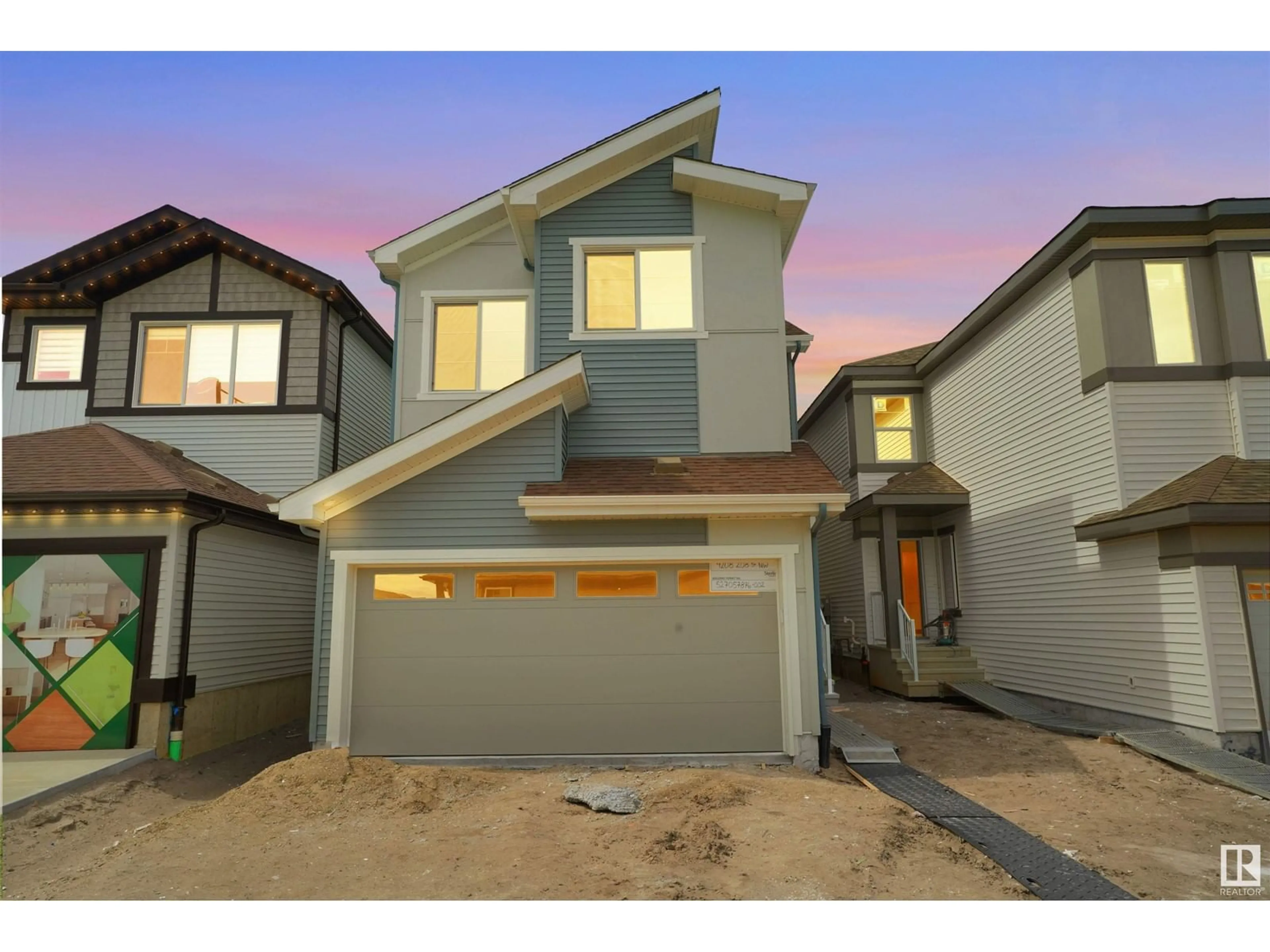 Home with vinyl exterior material, street for NW - 4208 208 ST, Edmonton Alberta T6M3E4