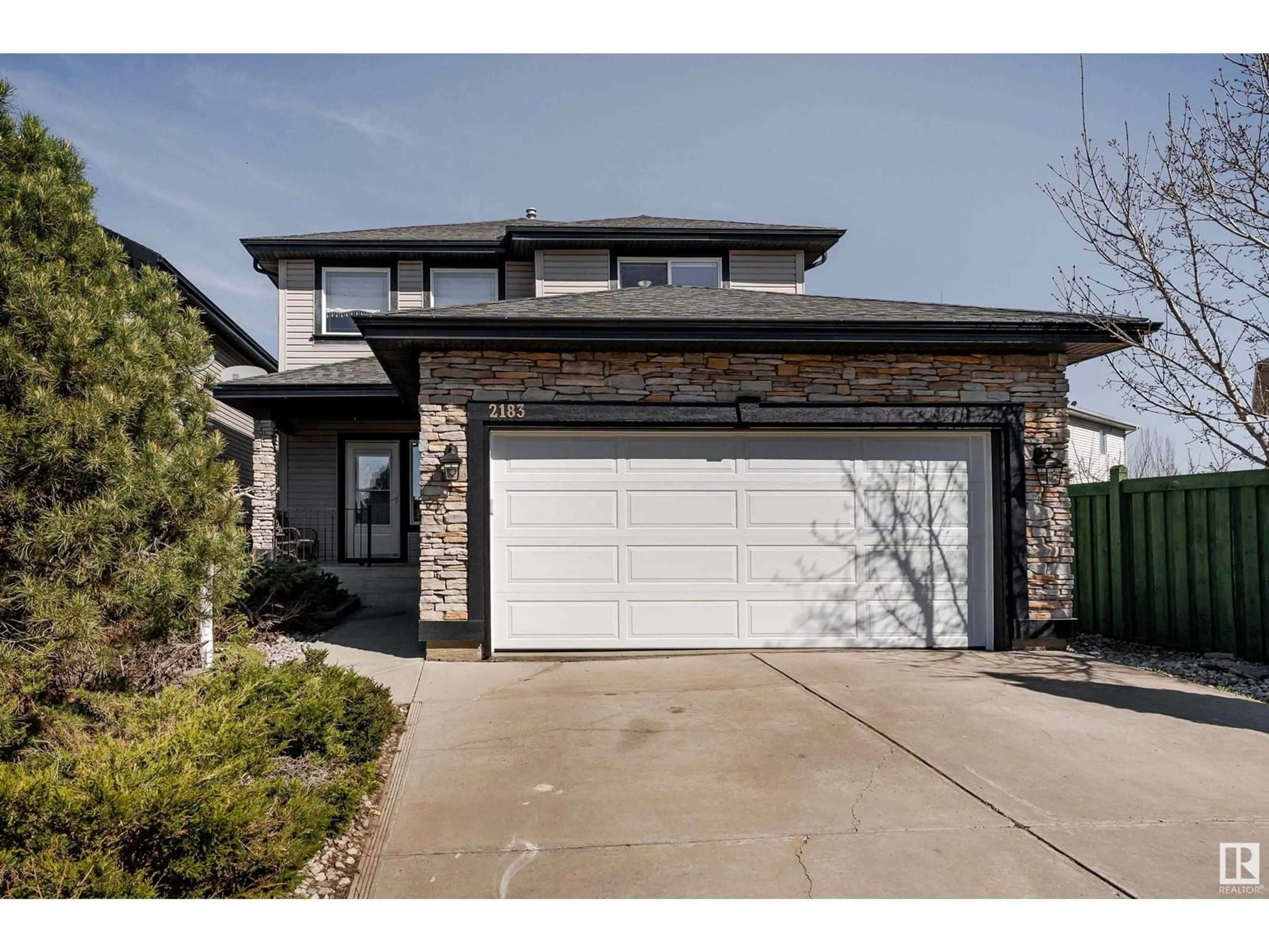 Home with brick exterior material, street for 2183 HADDOW DR, Edmonton Alberta T6R3M6