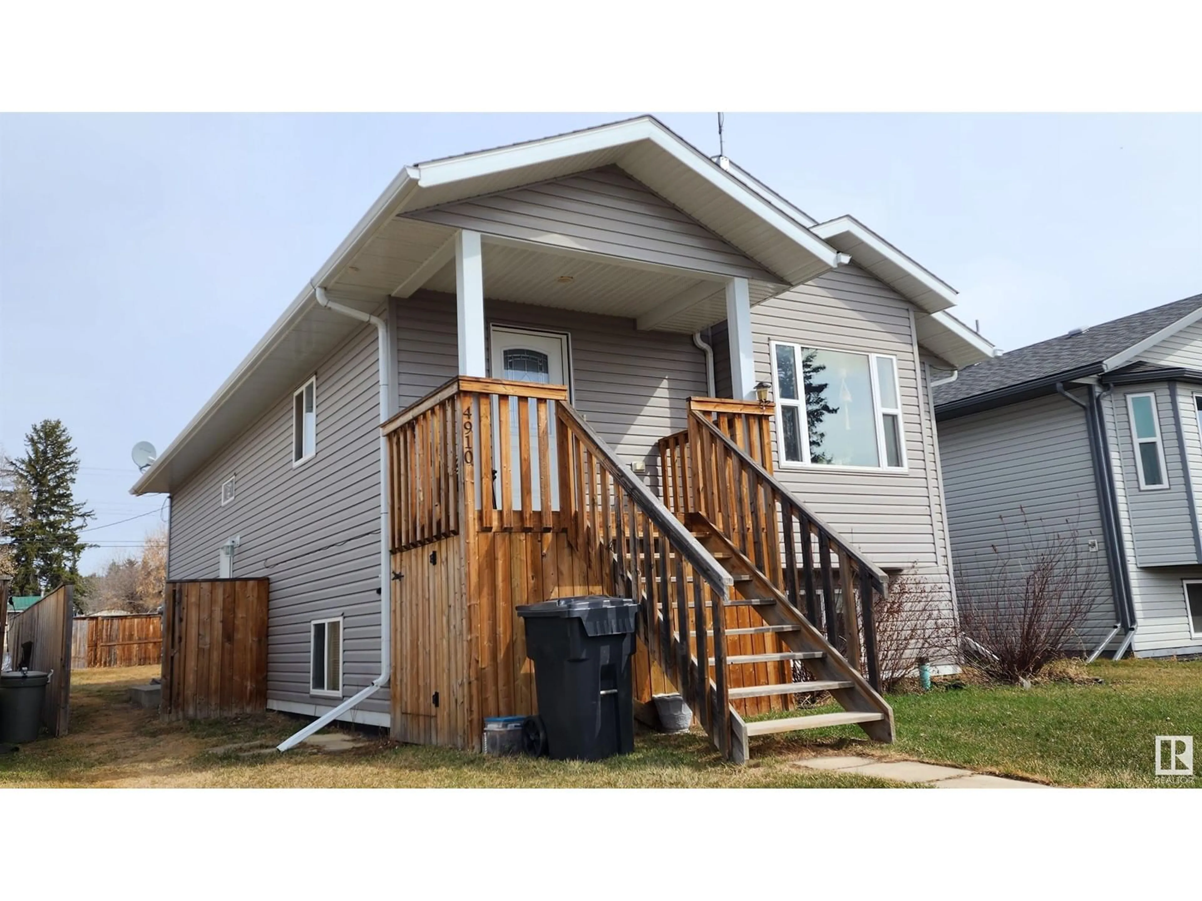 Home with vinyl exterior material, street for 4910 51 AV, Elk Point Alberta T0A1A0