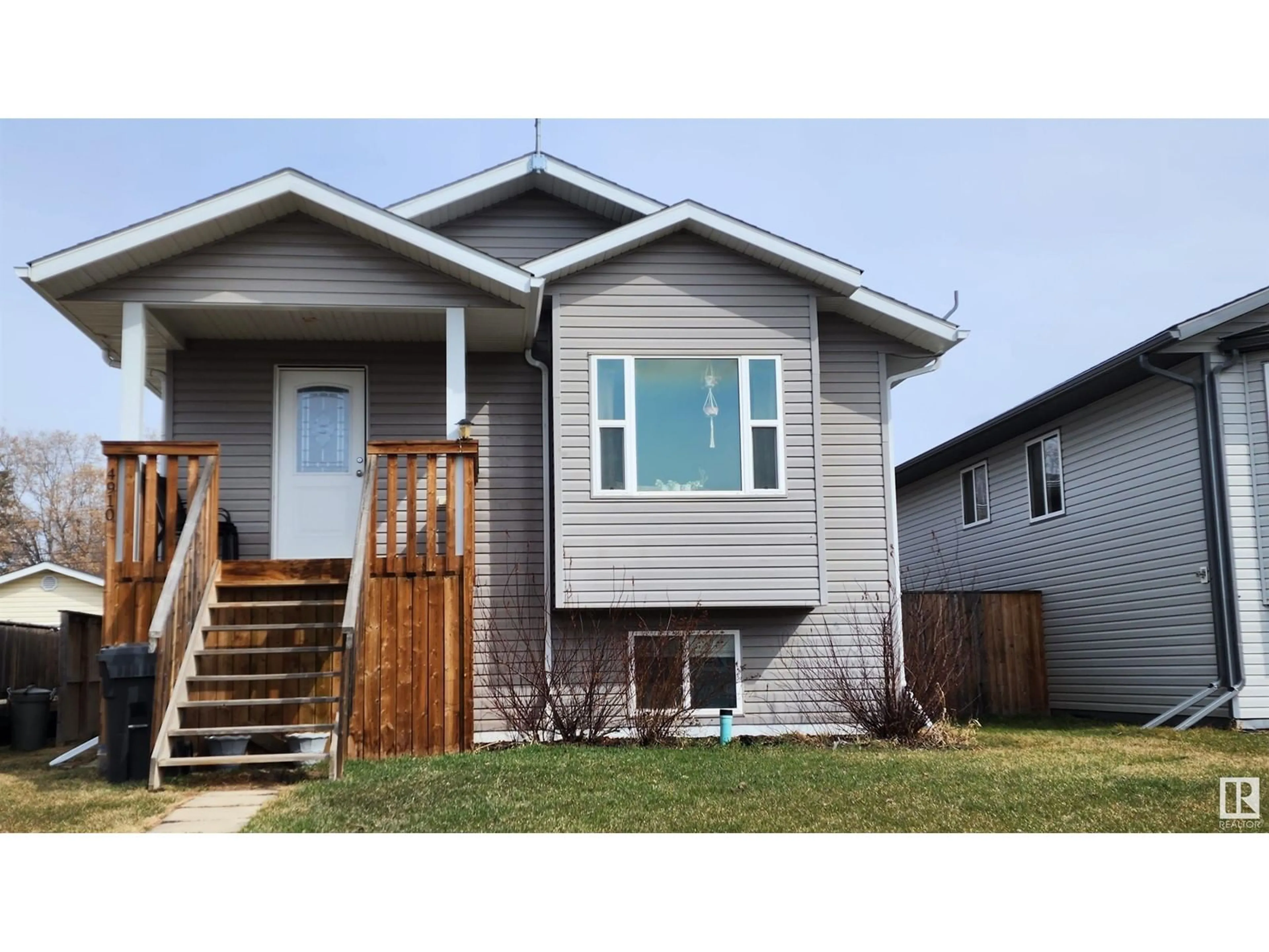 Home with vinyl exterior material, street for 4910 51 AV, Elk Point Alberta T0A1A0