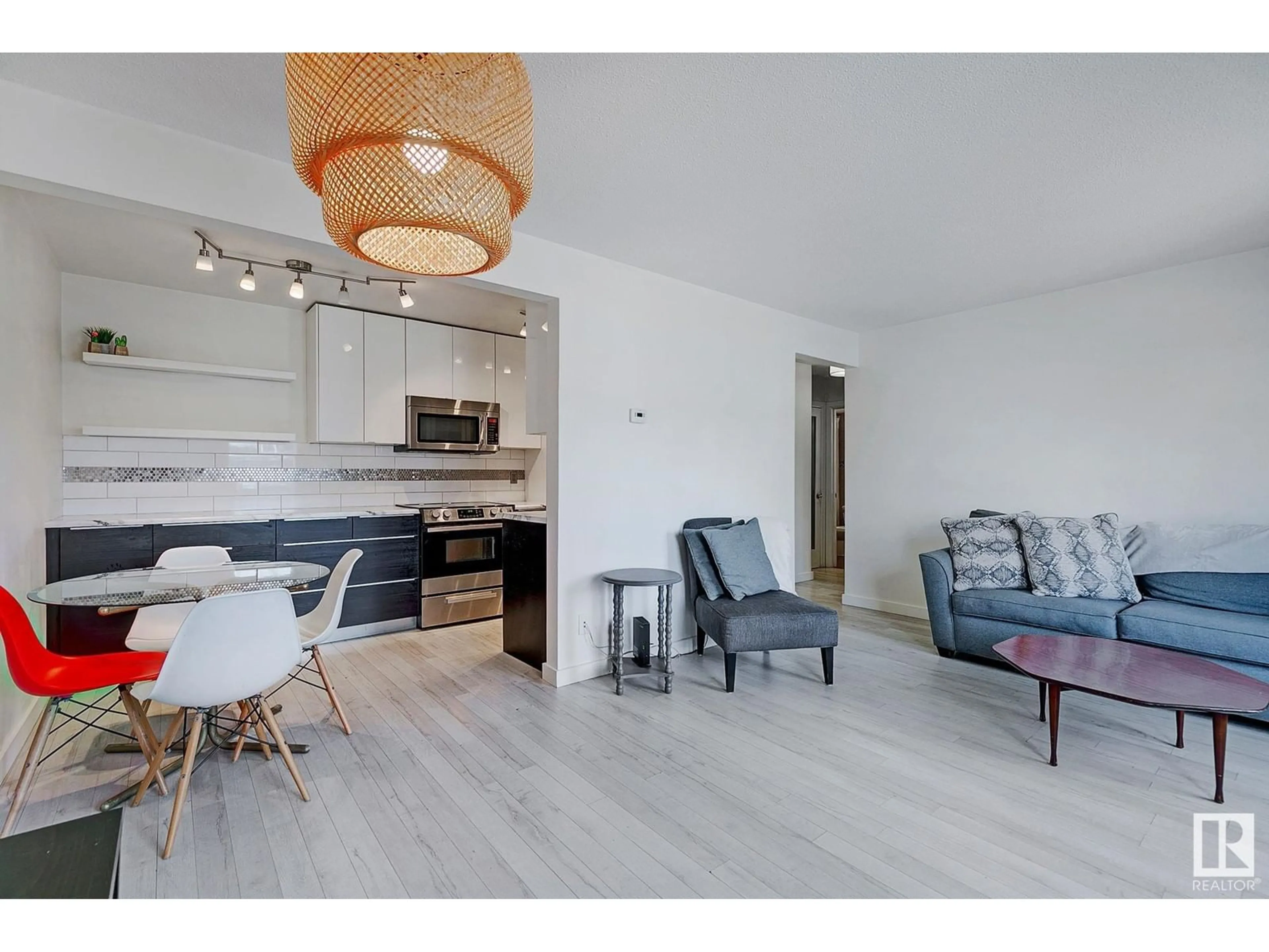 Open concept kitchen, wood/laminate floor for 207 - 10345 123 ST, Edmonton Alberta T5N1N5