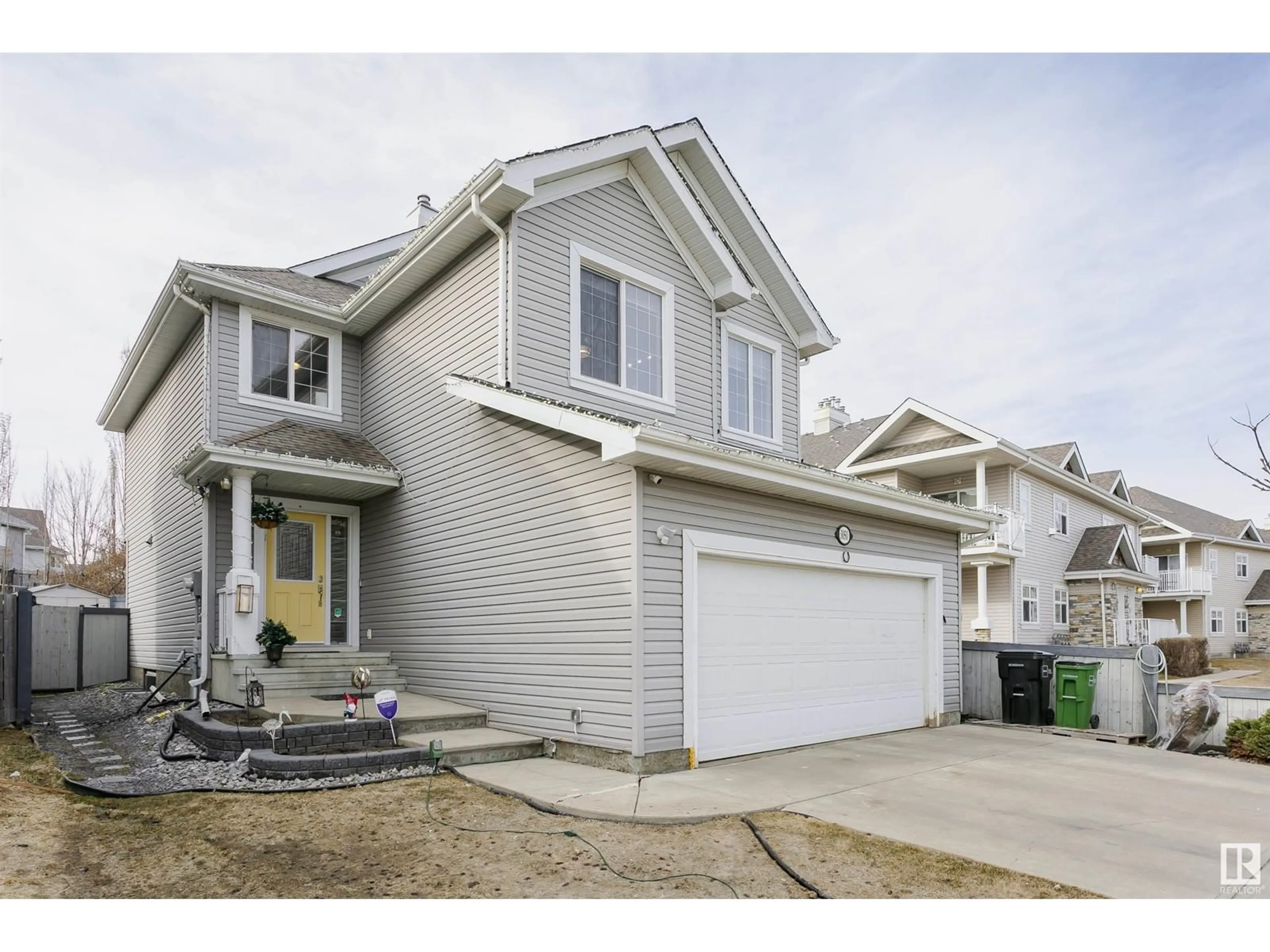 Home with vinyl exterior material, street for 3050 SPENCE WD, Edmonton Alberta T6X0A5
