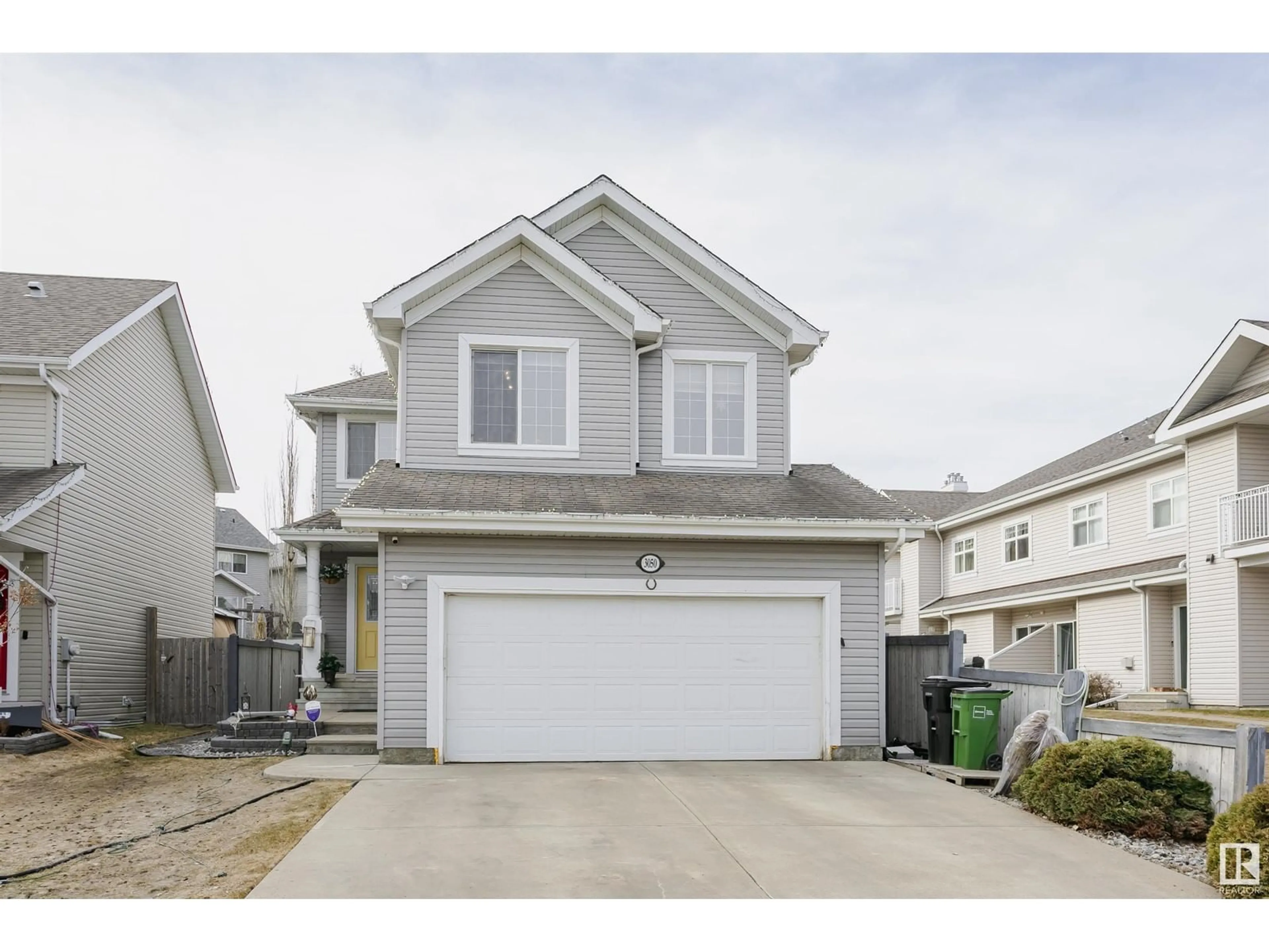 Home with vinyl exterior material, street for 3050 SPENCE WD, Edmonton Alberta T6X0A5