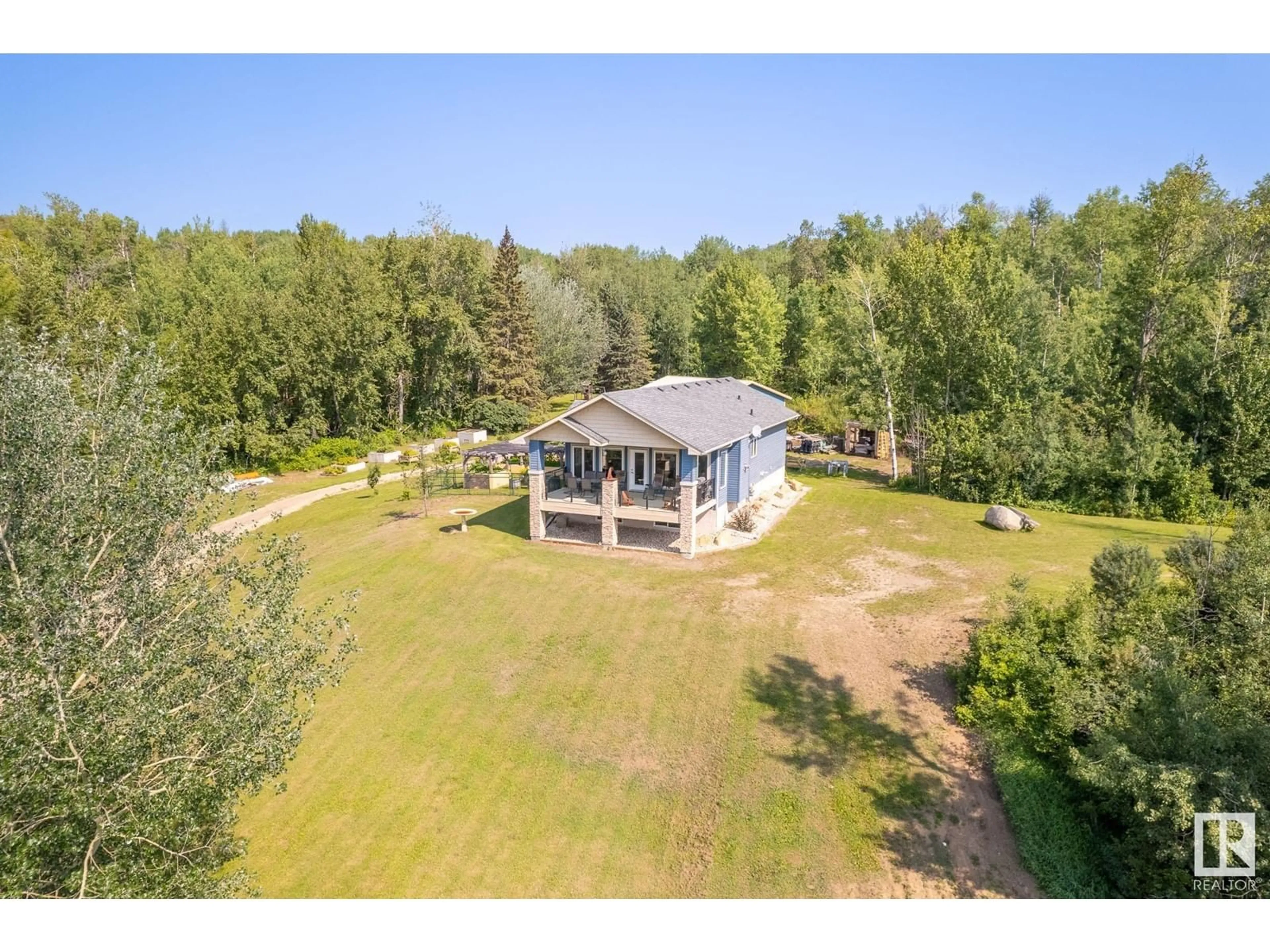 A pic from outside/outdoor area/front of a property/back of a property/a pic from drone, water/lake/river/ocean view for 4518 LAKESHORE RD, Rural Parkland County Alberta T0E2K0