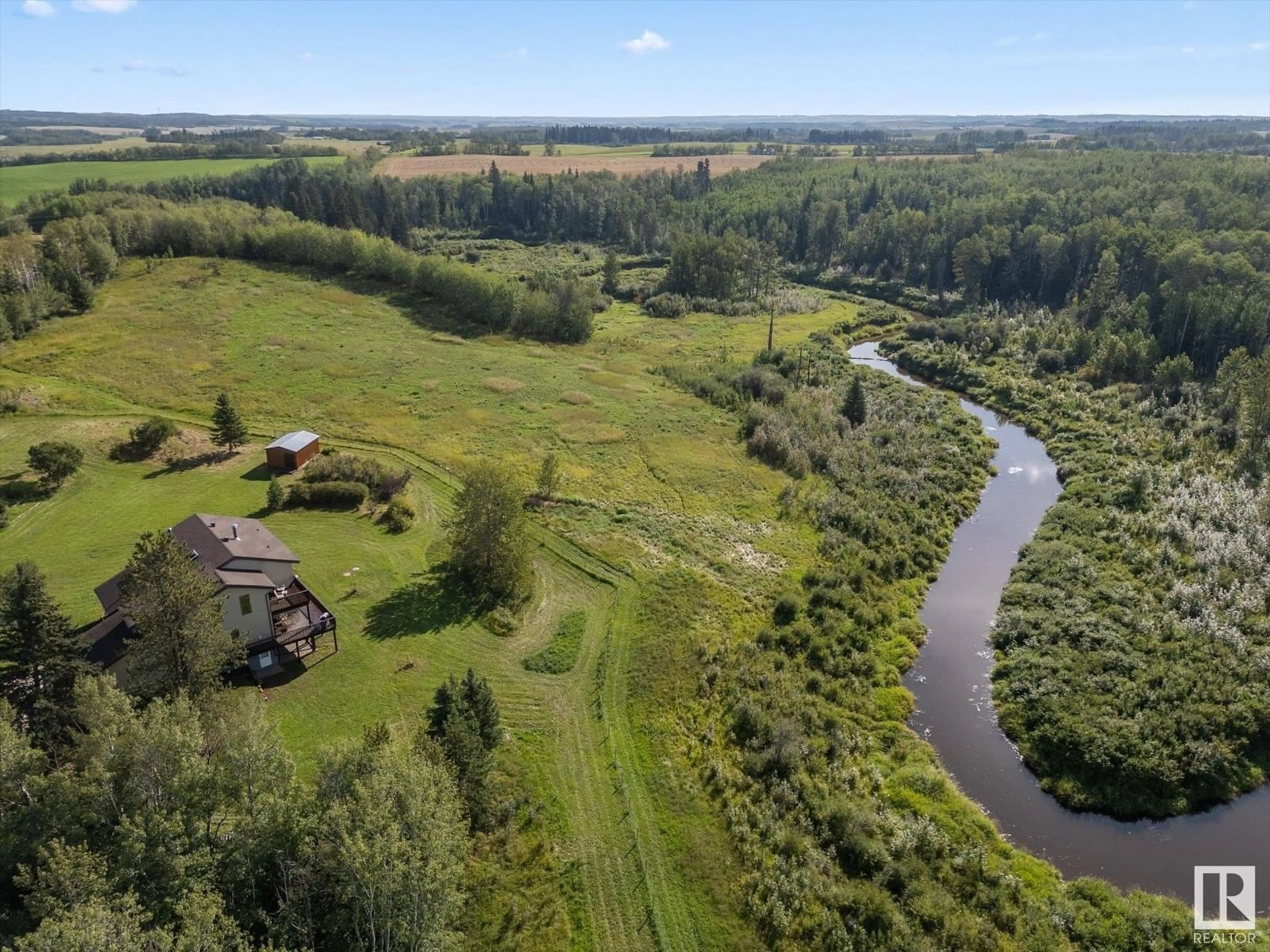 A pic from outside/outdoor area/front of a property/back of a property/a pic from drone, water/lake/river/ocean view for 8115 TOWNSHIP ROAD 574, Rural Lac Ste. Anne County Alberta T0E1N0
