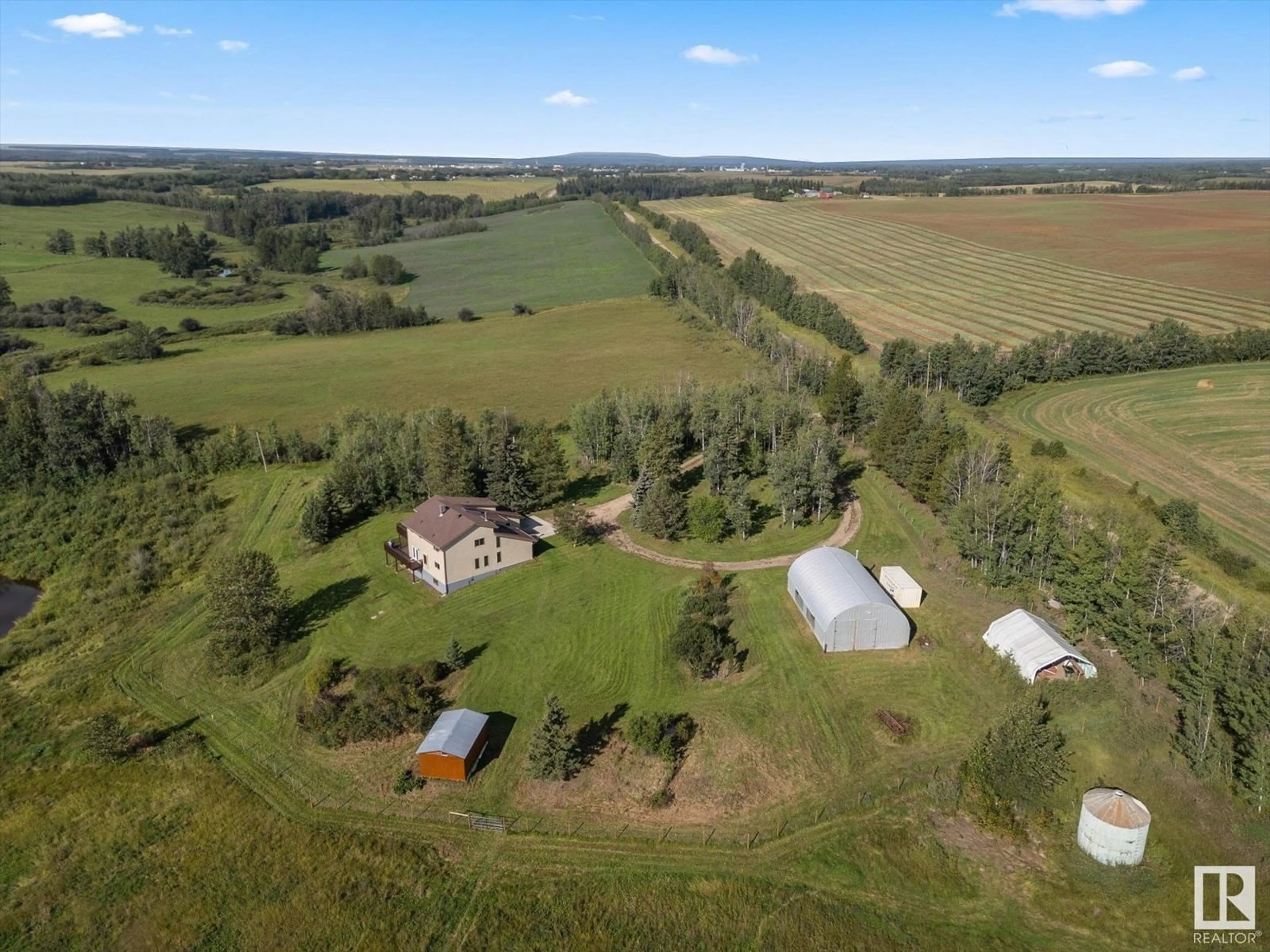 A pic from outside/outdoor area/front of a property/back of a property/a pic from drone, unknown for 8115 TOWNSHIP ROAD 574, Rural Lac Ste. Anne County Alberta T0E1N0