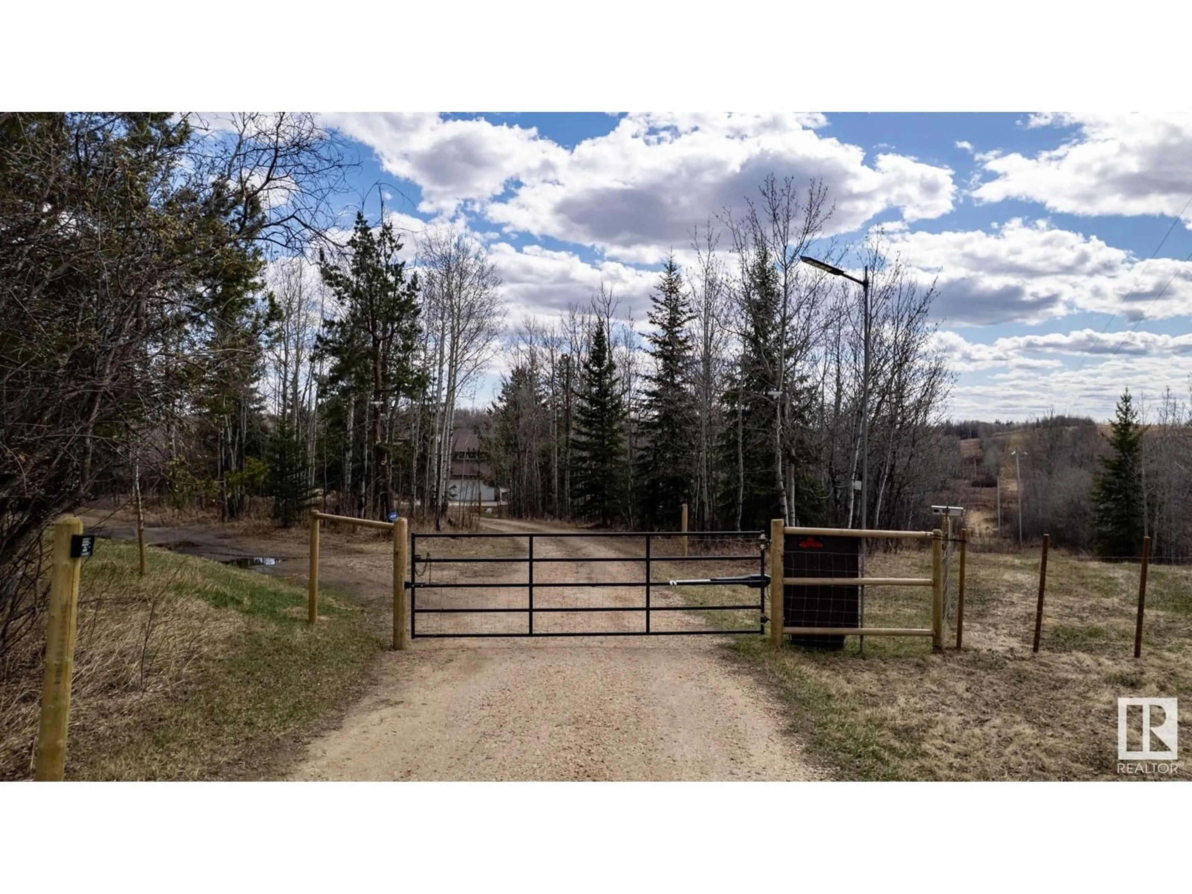 A pic from outside/outdoor area/front of a property/back of a property/a pic from drone, forest/trees view for 8115 TOWNSHIP ROAD 574, Rural Lac Ste. Anne County Alberta T0E1N0