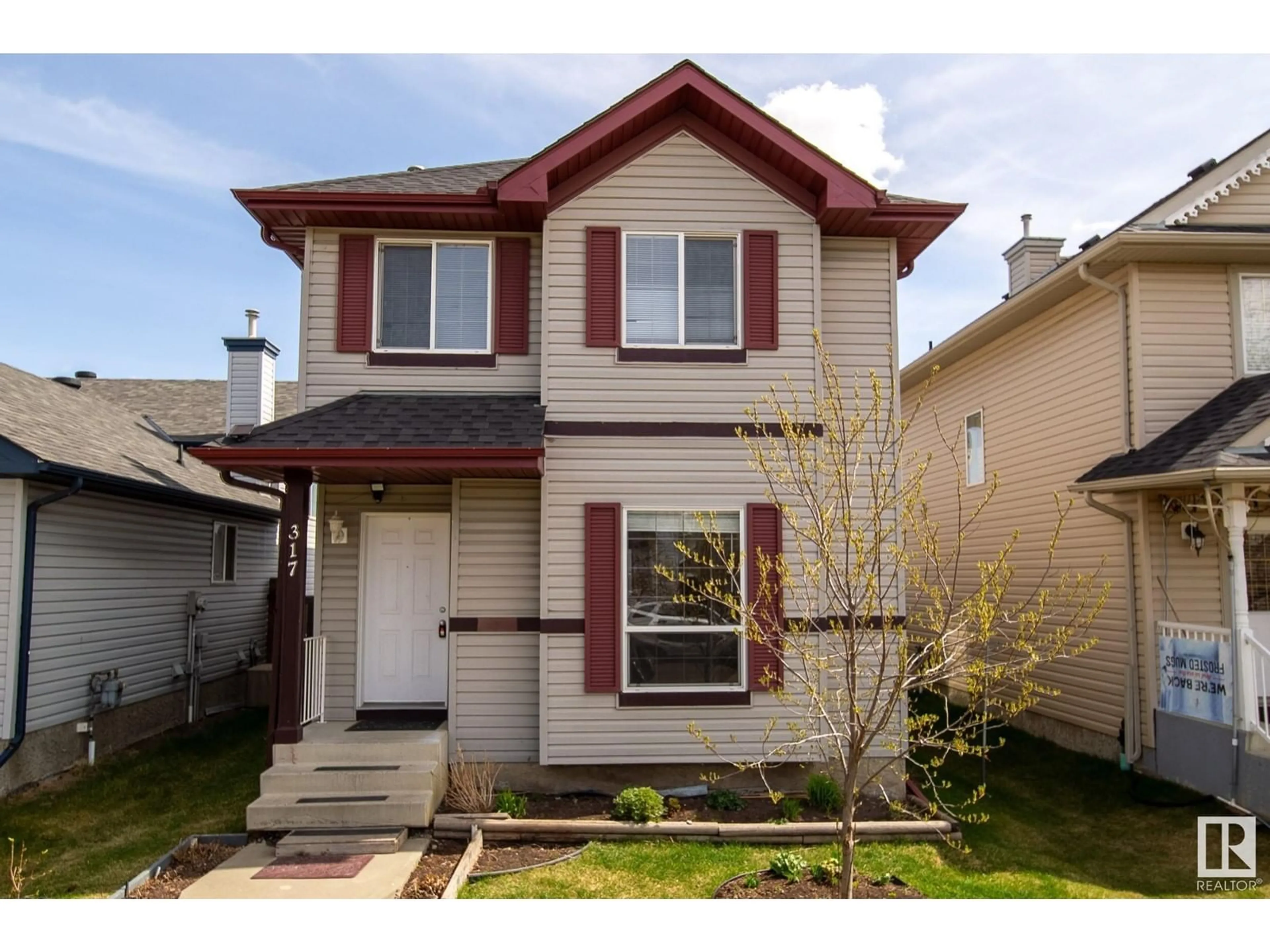 Home with vinyl exterior material, street for 317 85 ST, Edmonton Alberta T6X1H7