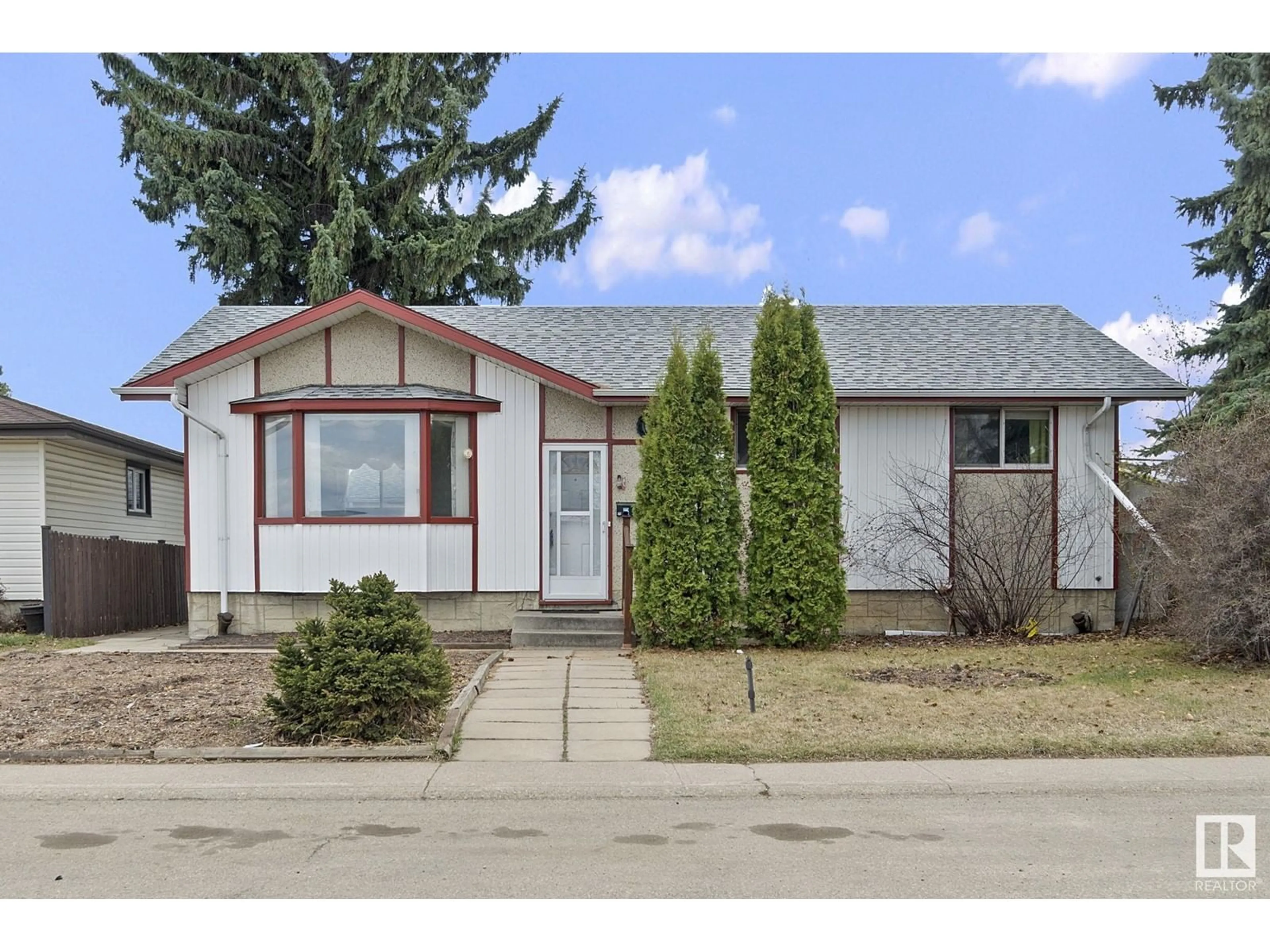 Home with vinyl exterior material, street for 7511 132 AV, Edmonton Alberta T5C3C6
