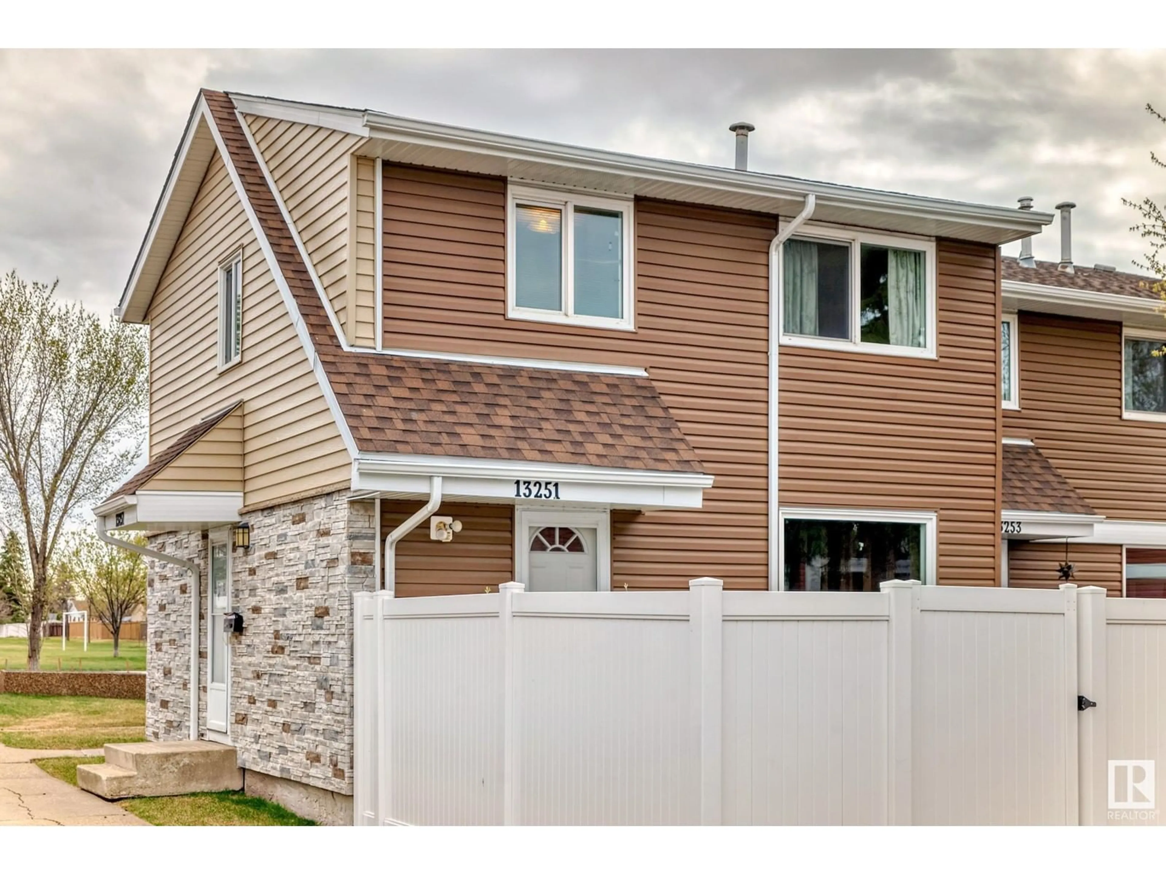 Home with vinyl exterior material, street for NW - 13251 47 ST, Edmonton Alberta T5A3L5