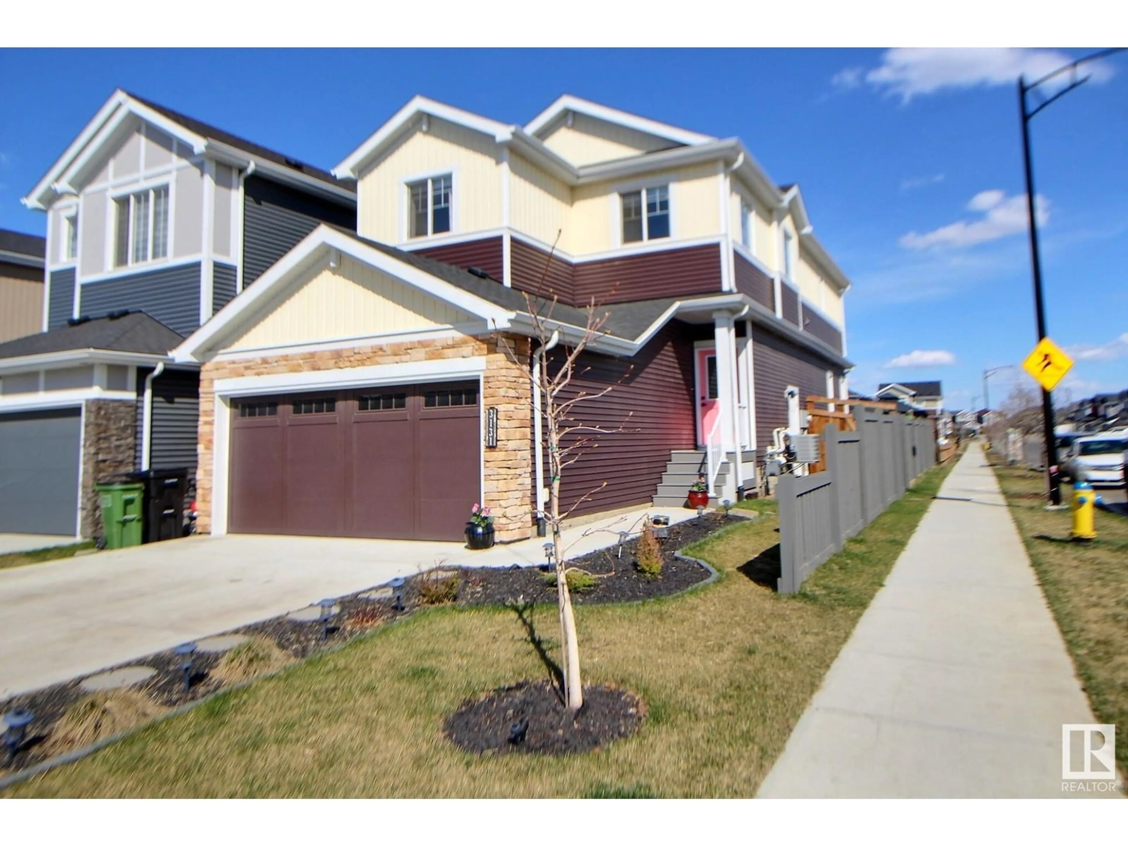 Home with vinyl exterior material, street for SW - 3131 169 ST, Edmonton Alberta T6W5A4